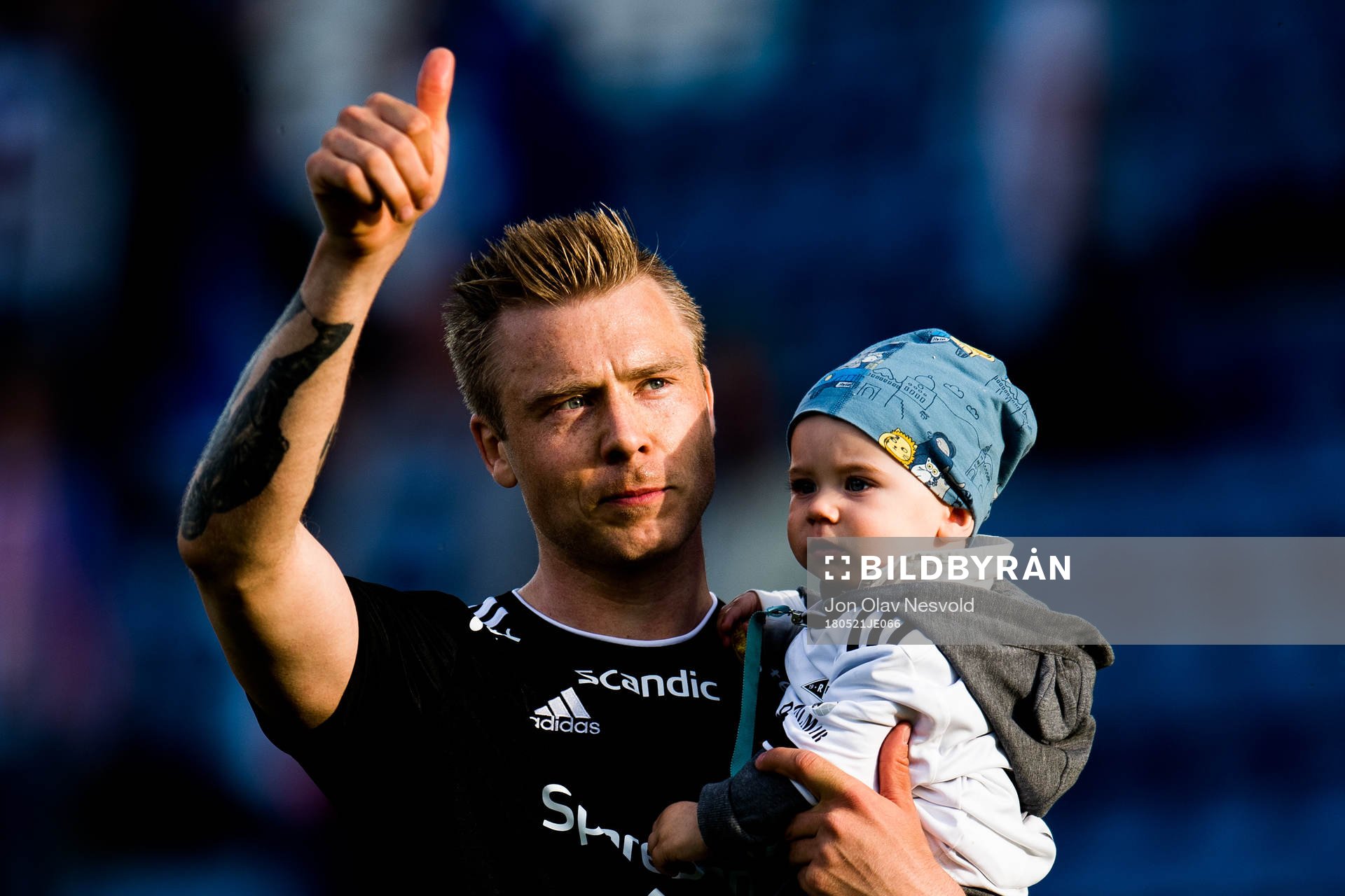 Alexander Søderlund of Rosenborg celebrates with his son