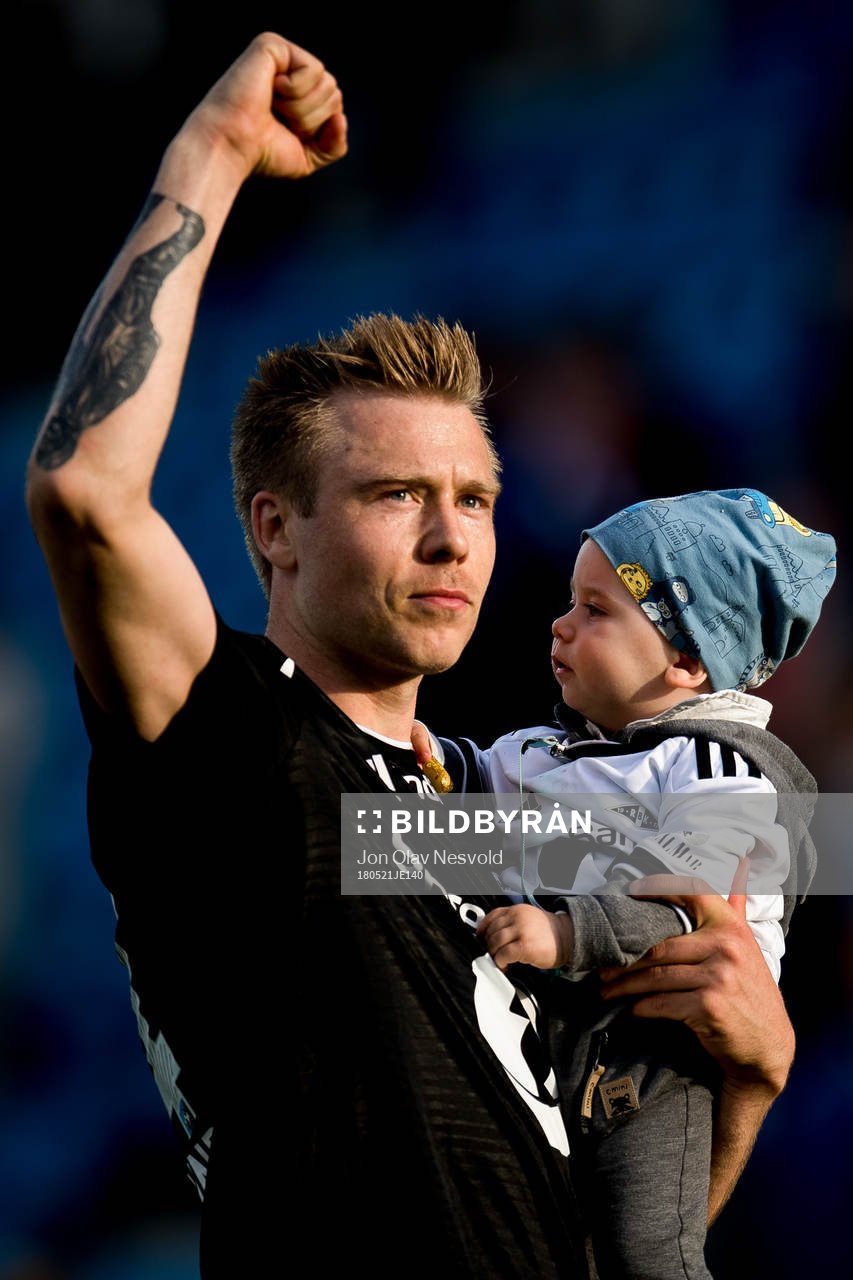 Alexander Søderlund of Rosenborg celebrates with his son