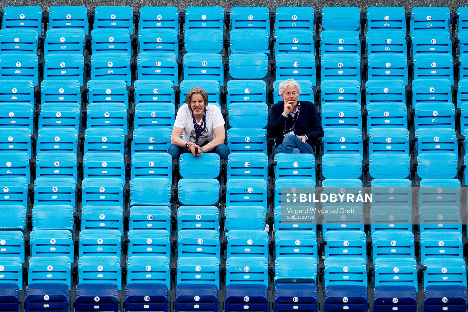 Jan Åge Fjørtoft, of Viasat, and Morten Pedersen, of Dagbladet, in the stands during a Lyon training session on May 23, 2018 in Kyiv.