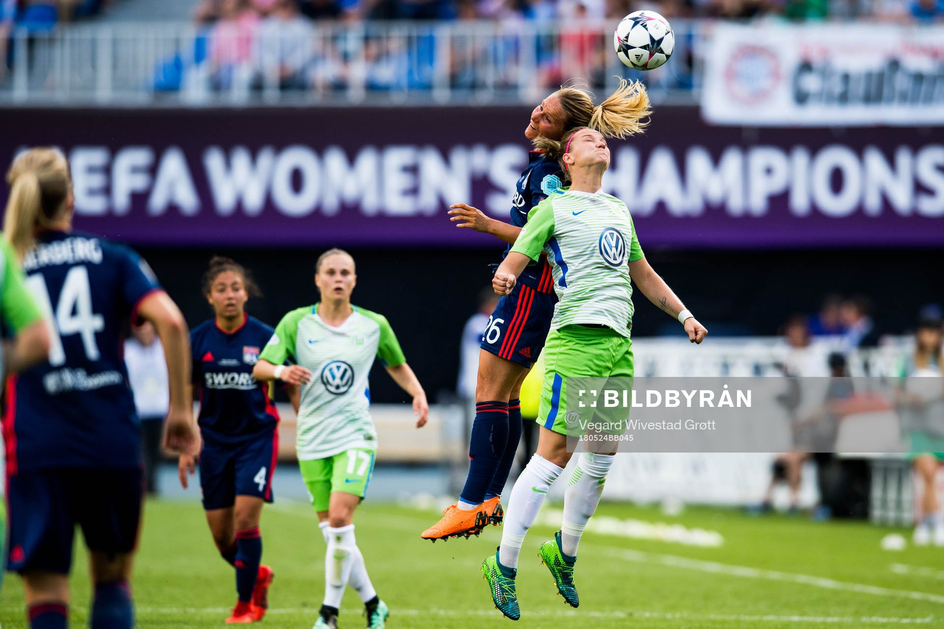 Amandine Henry of Lyon and Alexandra Popp of Wolfsburg