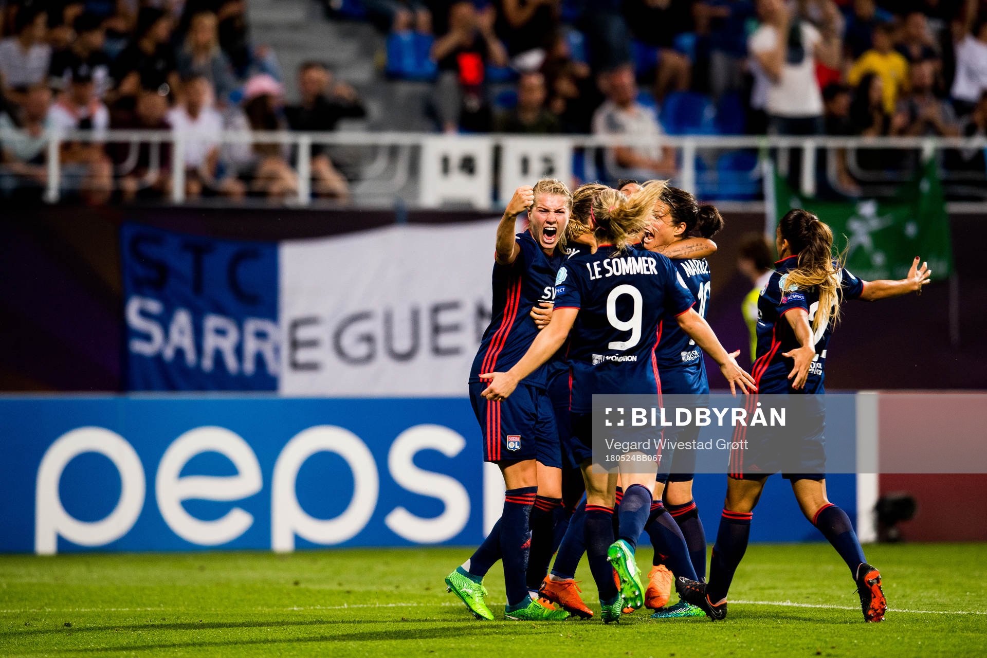 Ada Hegerberg celebrates with Eugénie Le Sommer and