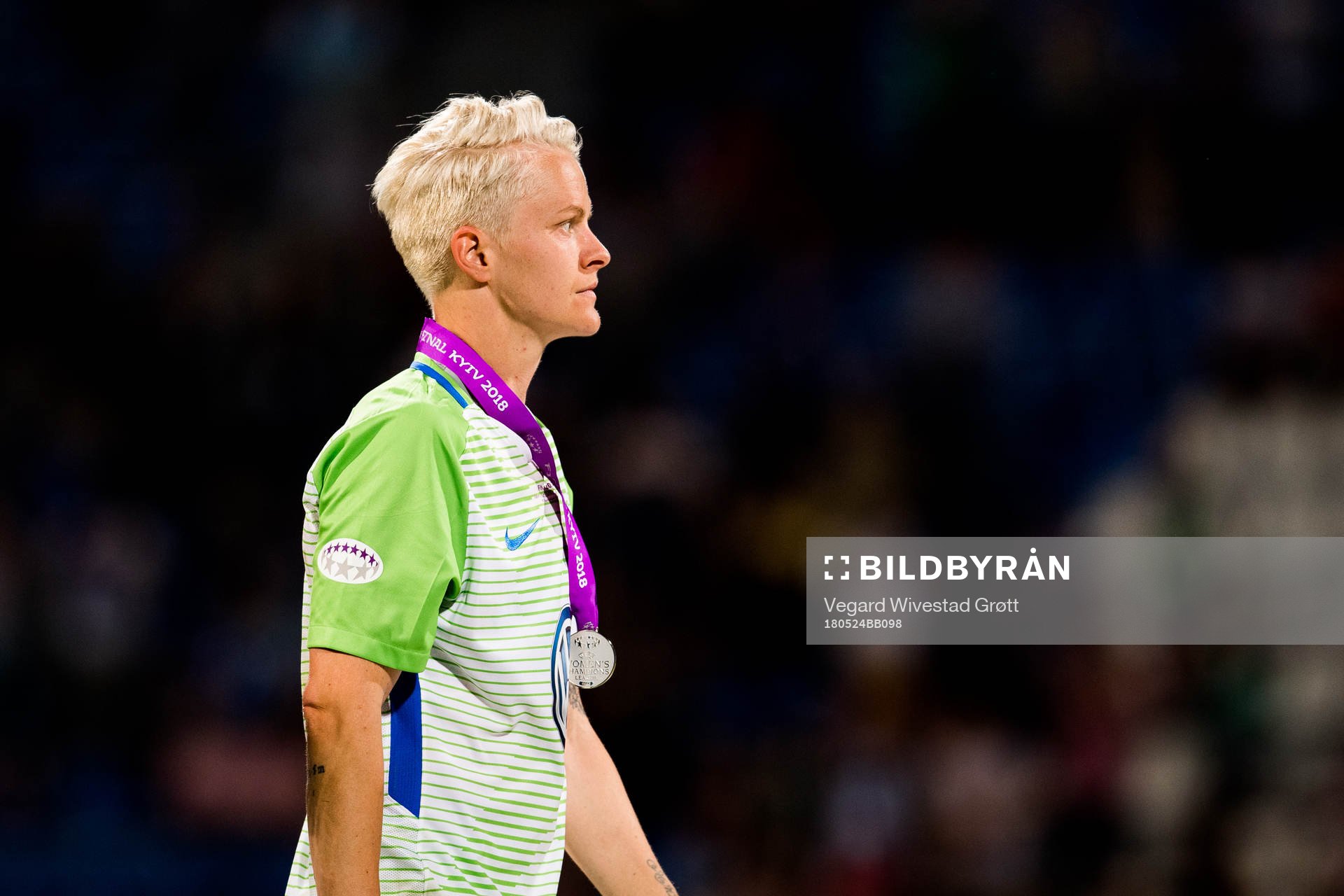 Nilla Fischer of Wolfsburg looks dejected