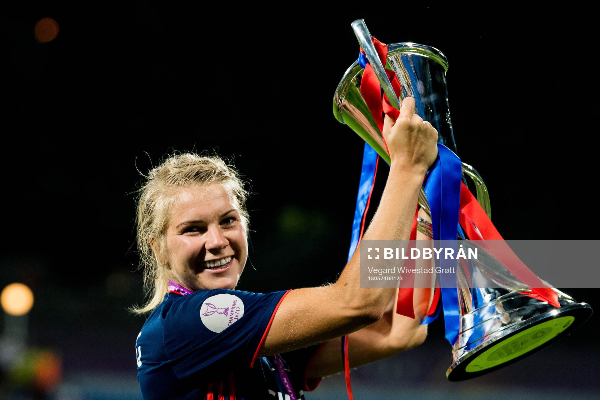 Ada Hegerberg of Lyon celebrates with the trophy