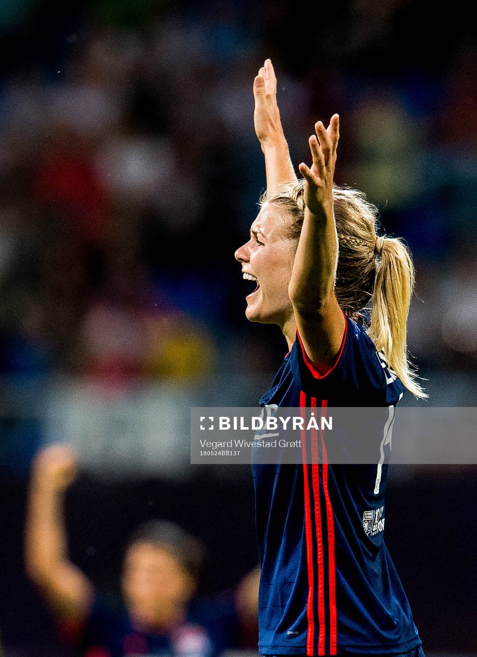 Ada Hegerberg of Lyon celebrates at the final whistle