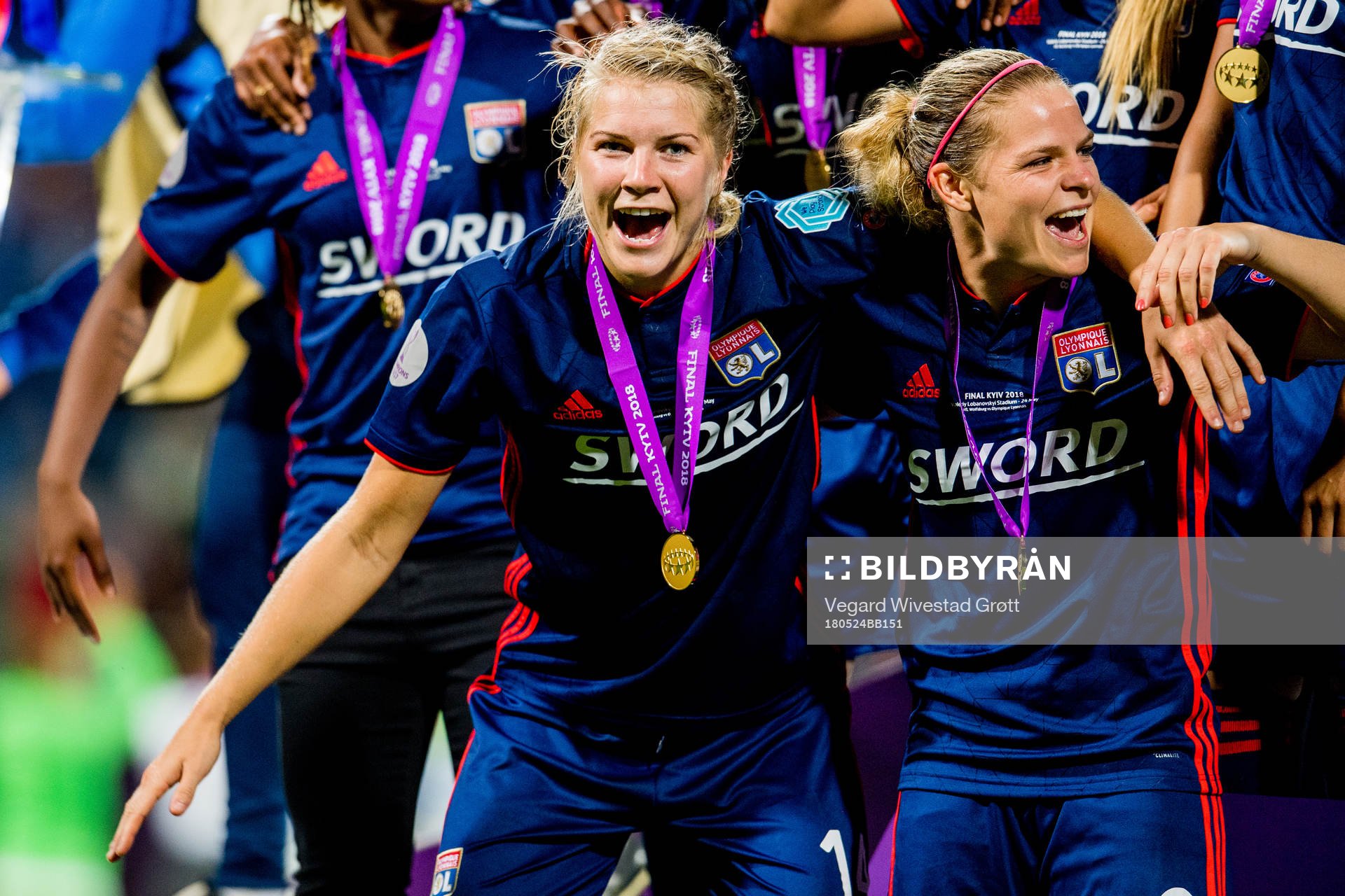 Ada Hegerberg and Eugénie Le Sommer of Lyon celebrate