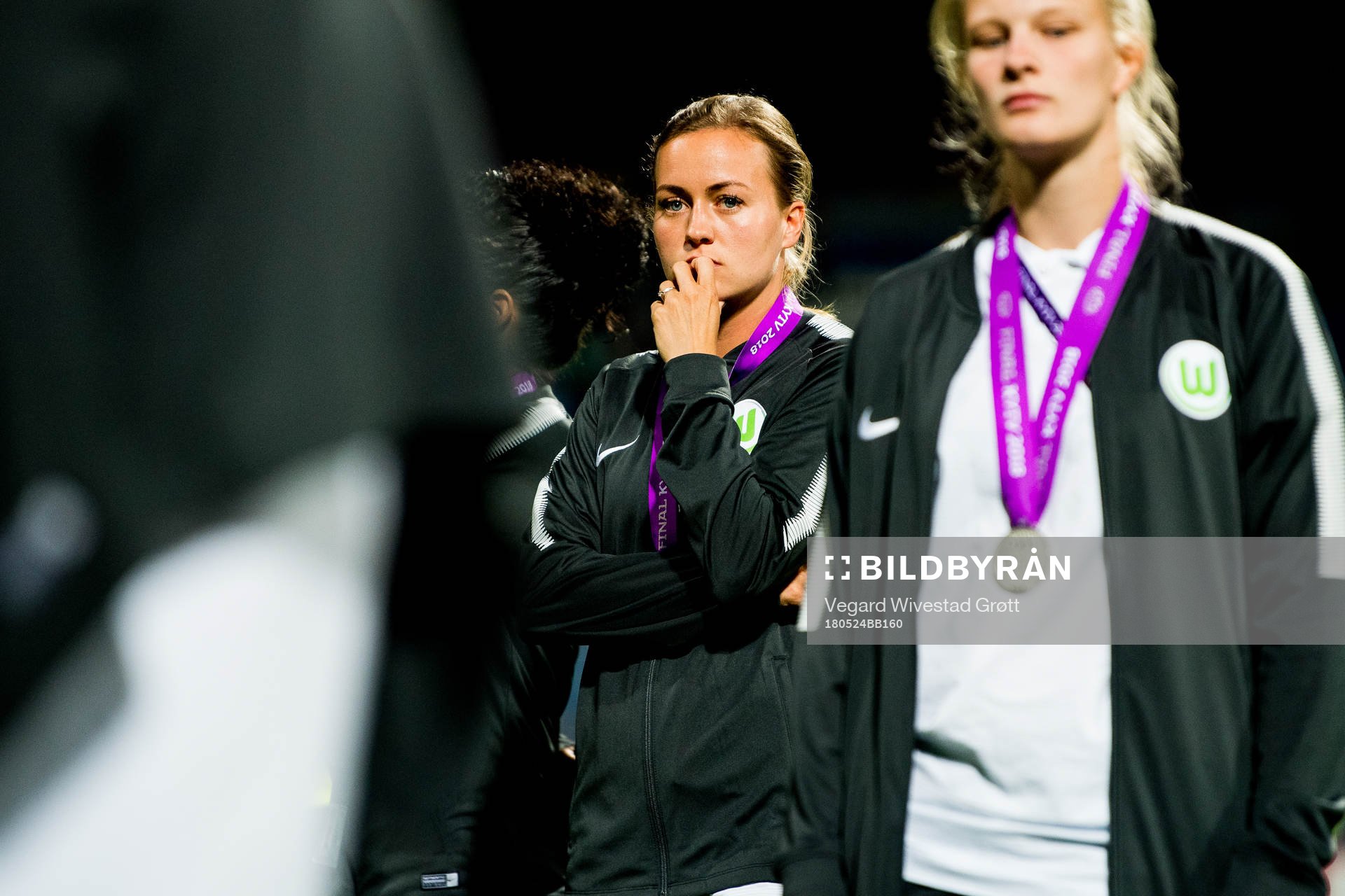 Kristine Minde of Wolfsburg looks dejected