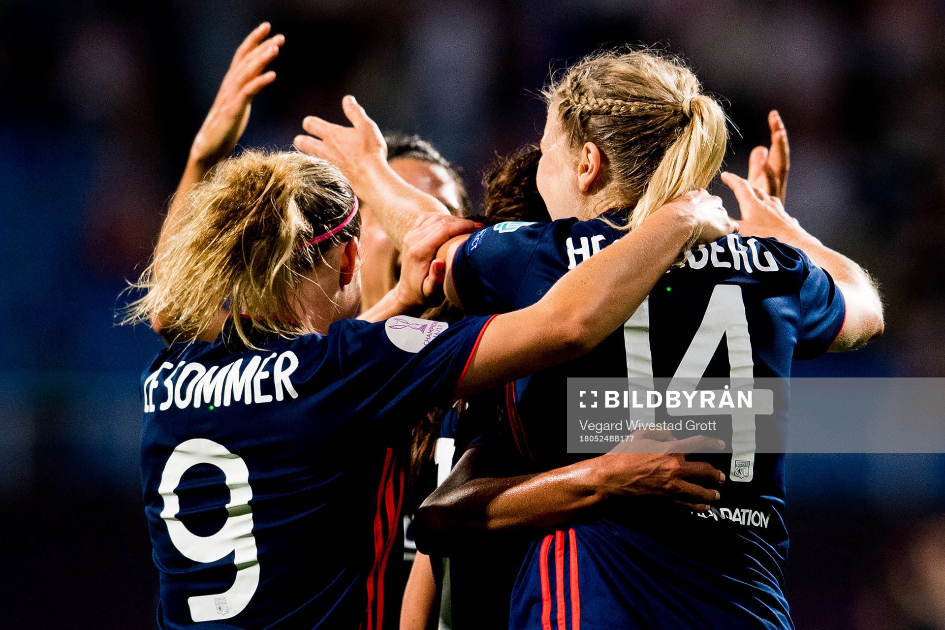 Ada Hegerberg of Lyon celebrates with teammate Eugénie Le