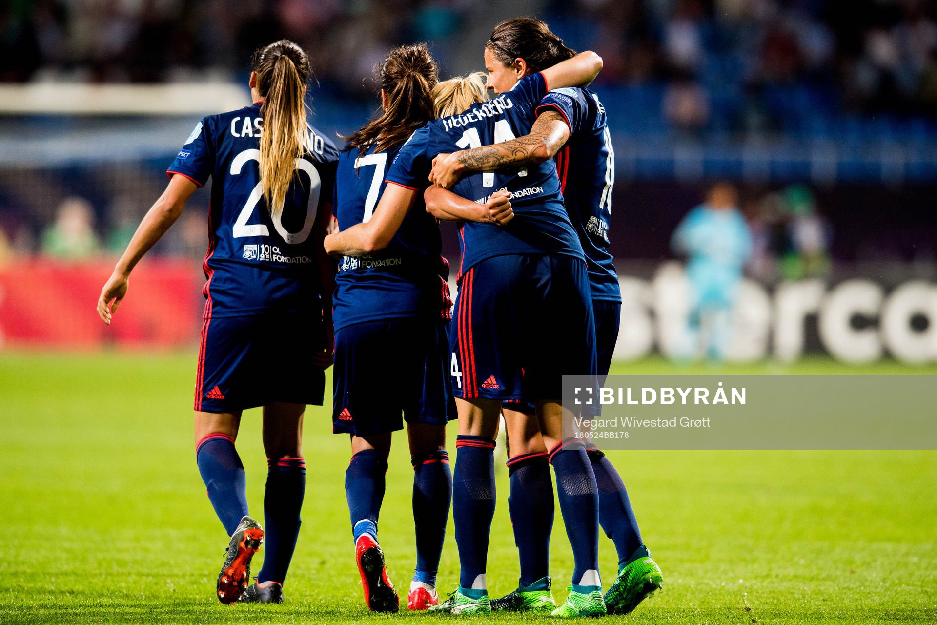 Ada Hegerberg of Lyon celebrates with teammates Delphine