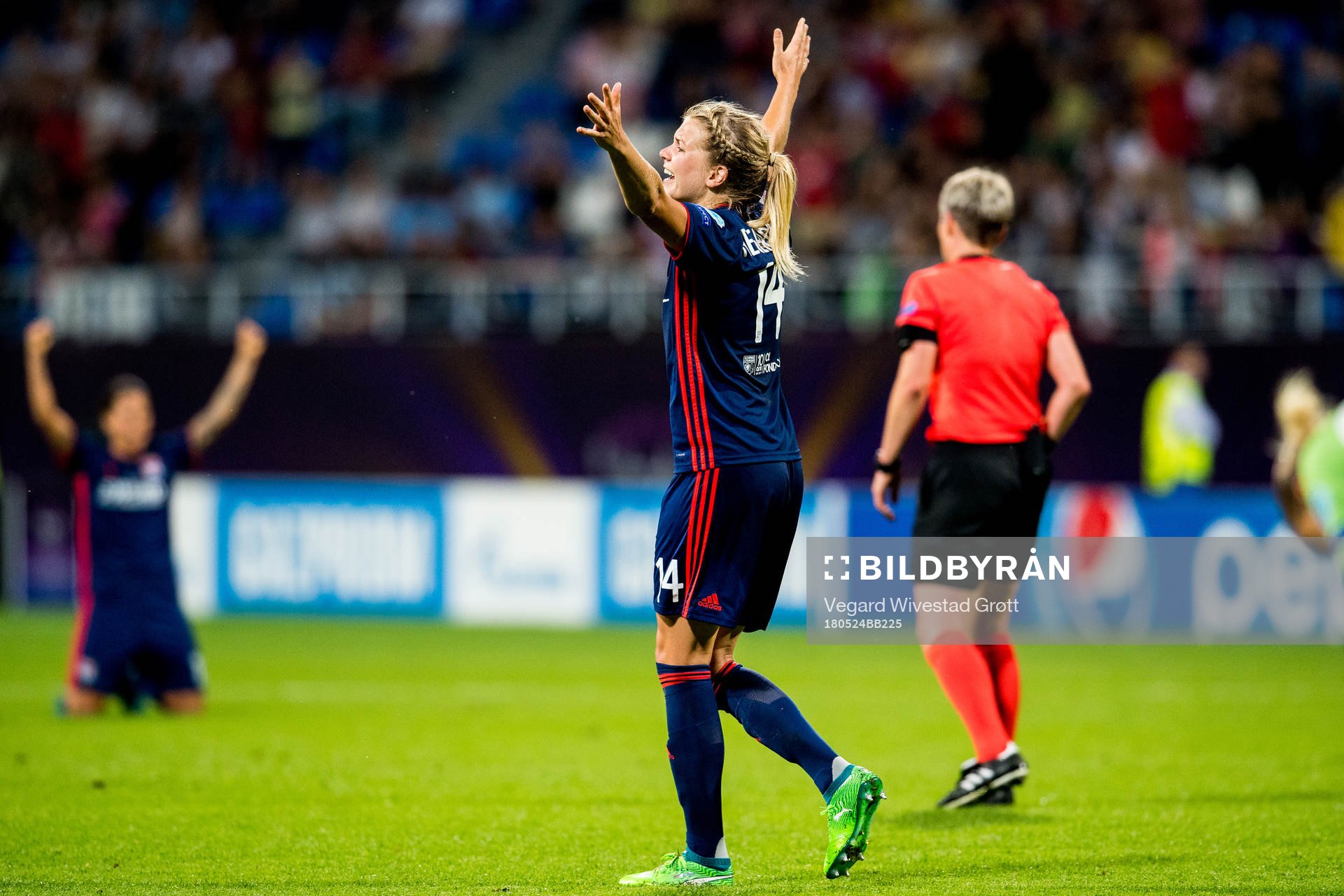 Ada Hegerberg of Lyon celebrates at the final whistle