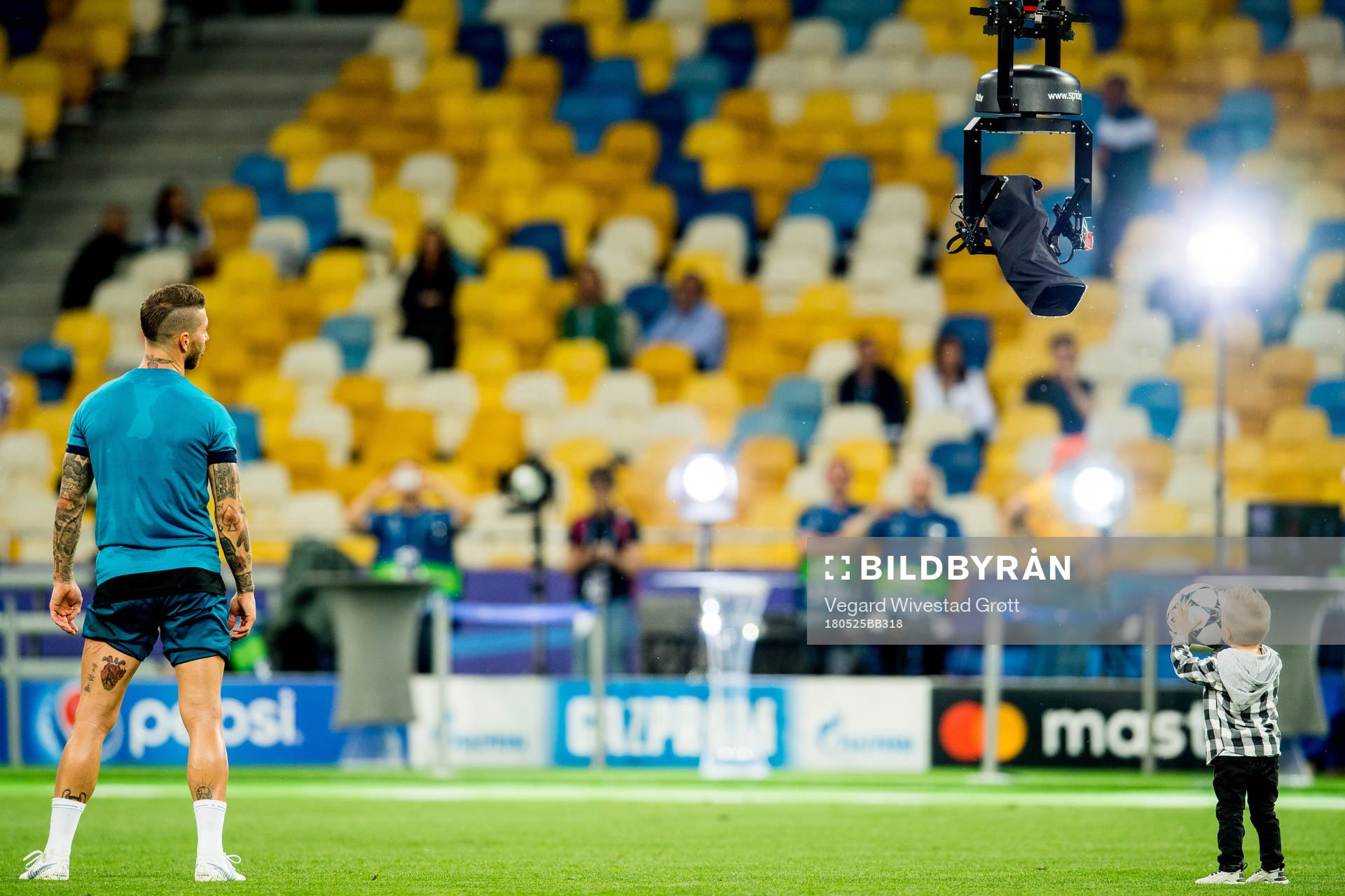Sergio Ramos of Real Madrid with his son Marco Ramos Rubio during a training session on May 25, 2018 in Kyiv.