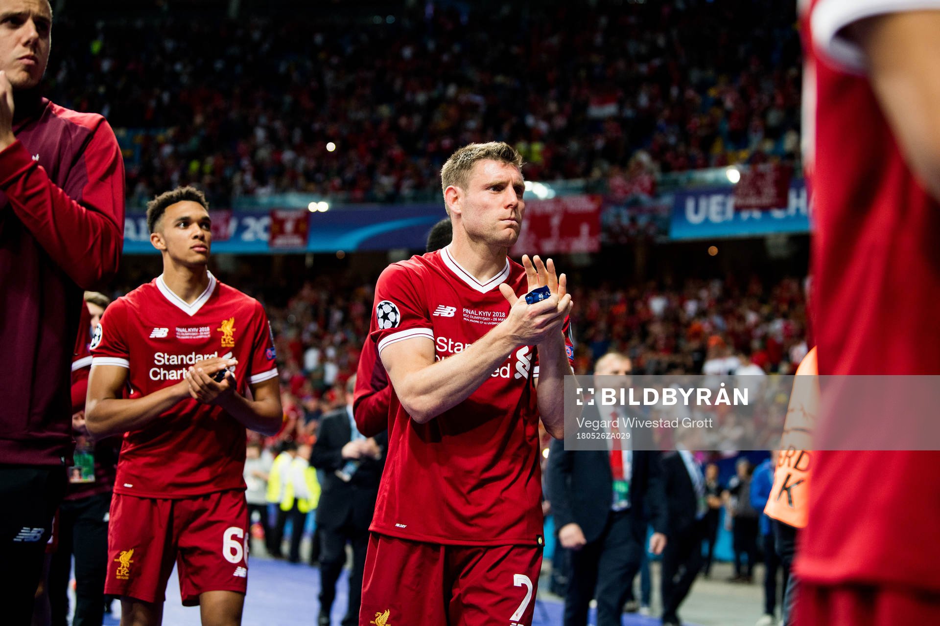 James Milner of Liverpool looks dejected