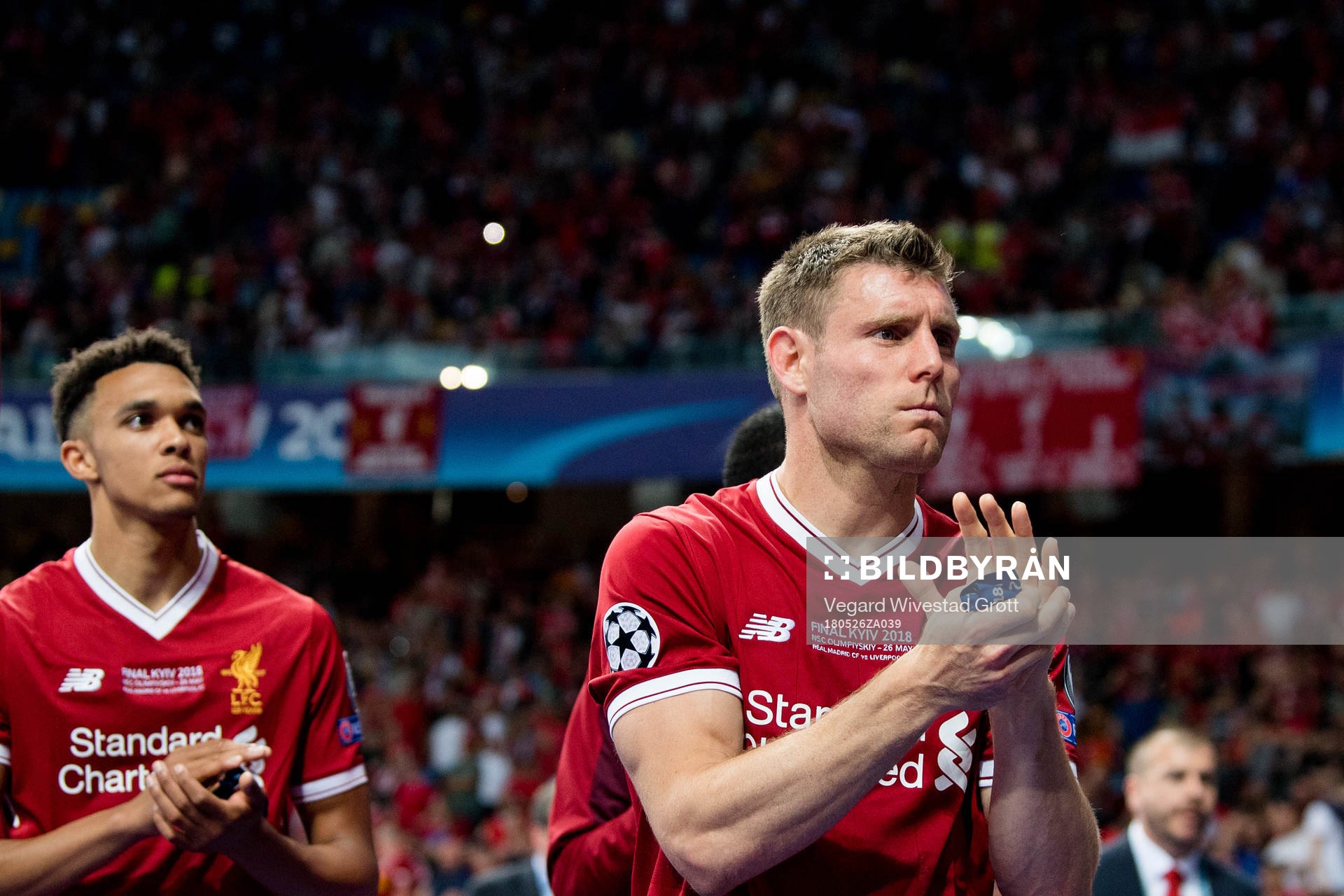 James Milner of Liverpool looks dejected