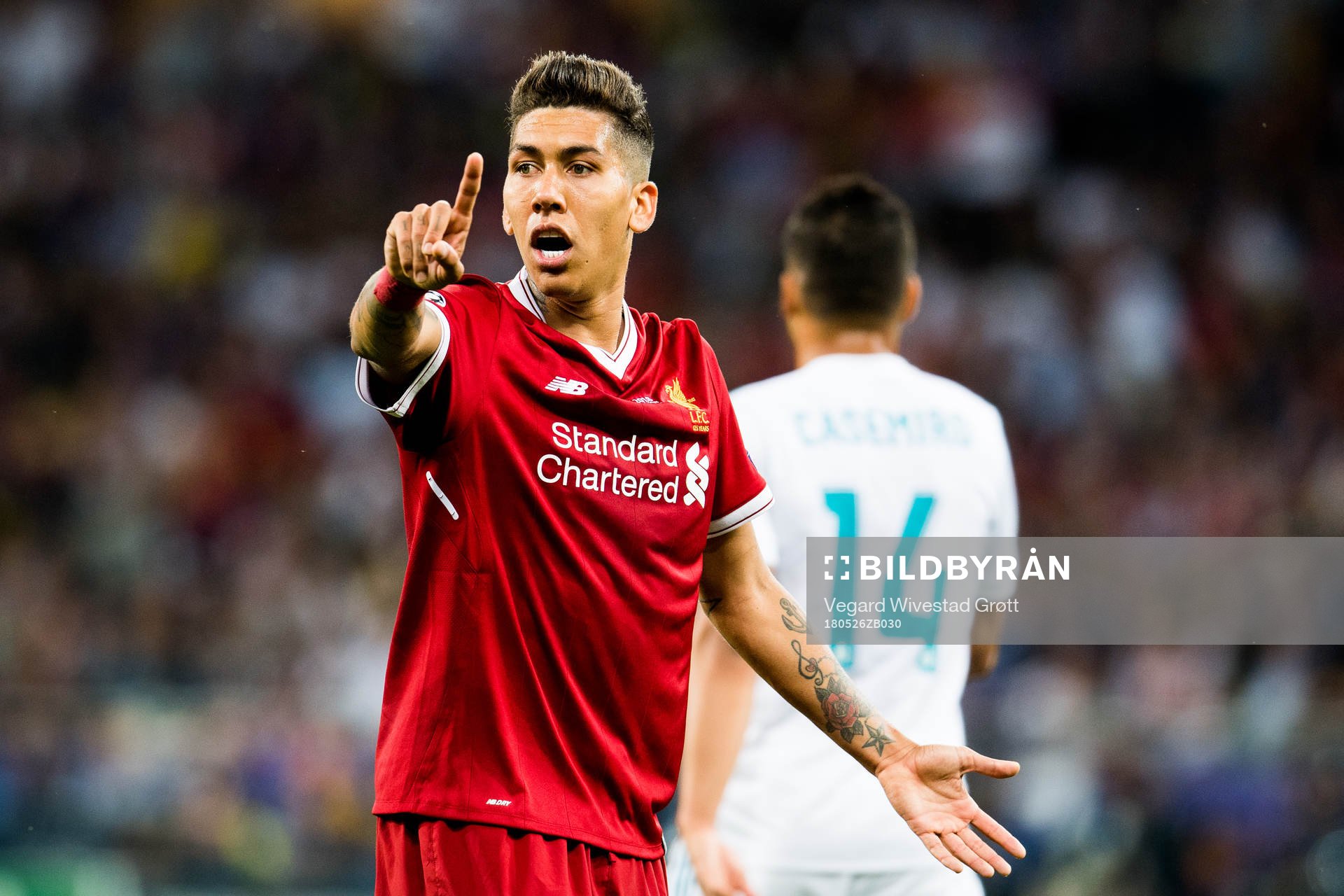 Roberto Firmino of Liverpool reacts