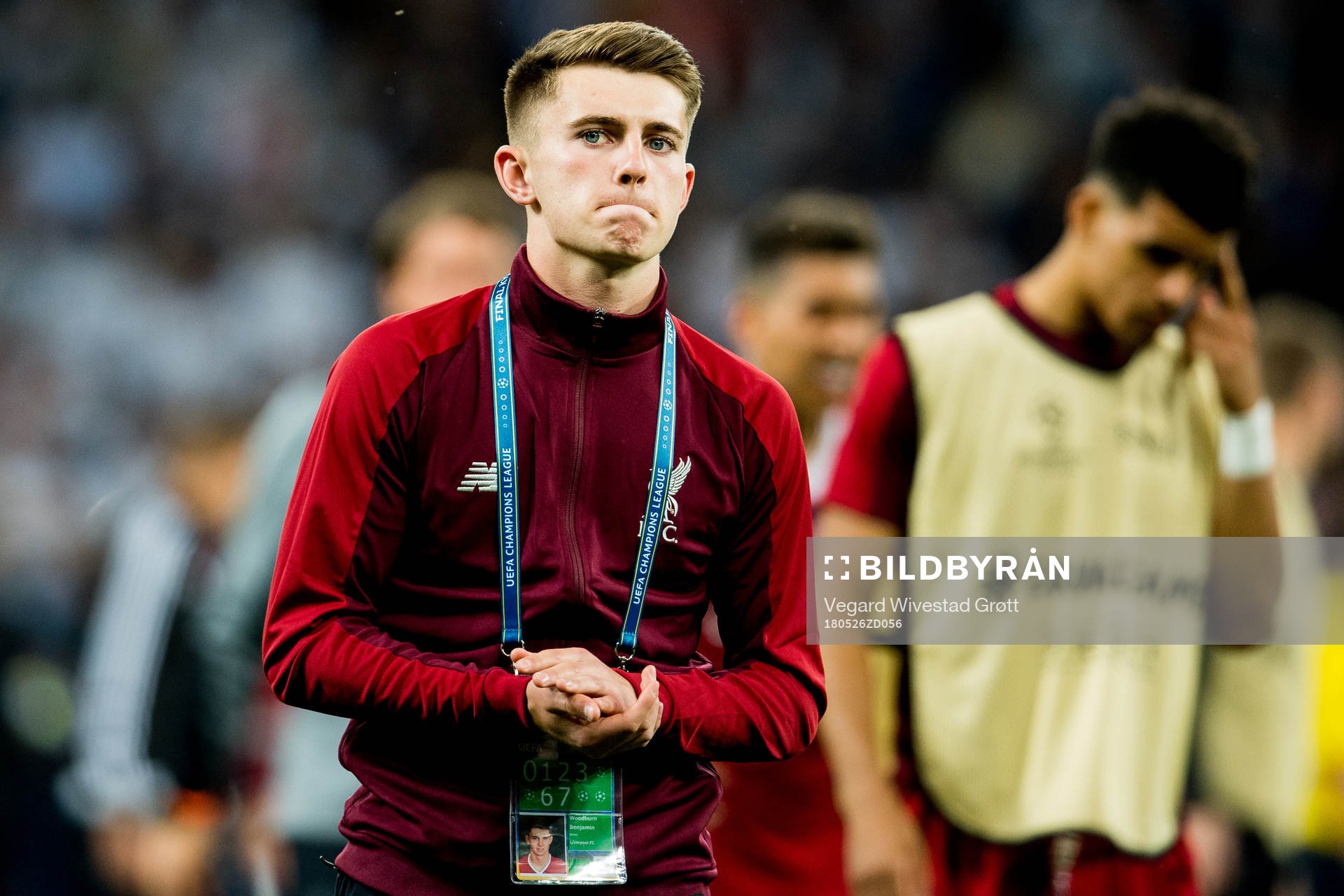 Ben Woodburn of Liverpool looks dejected