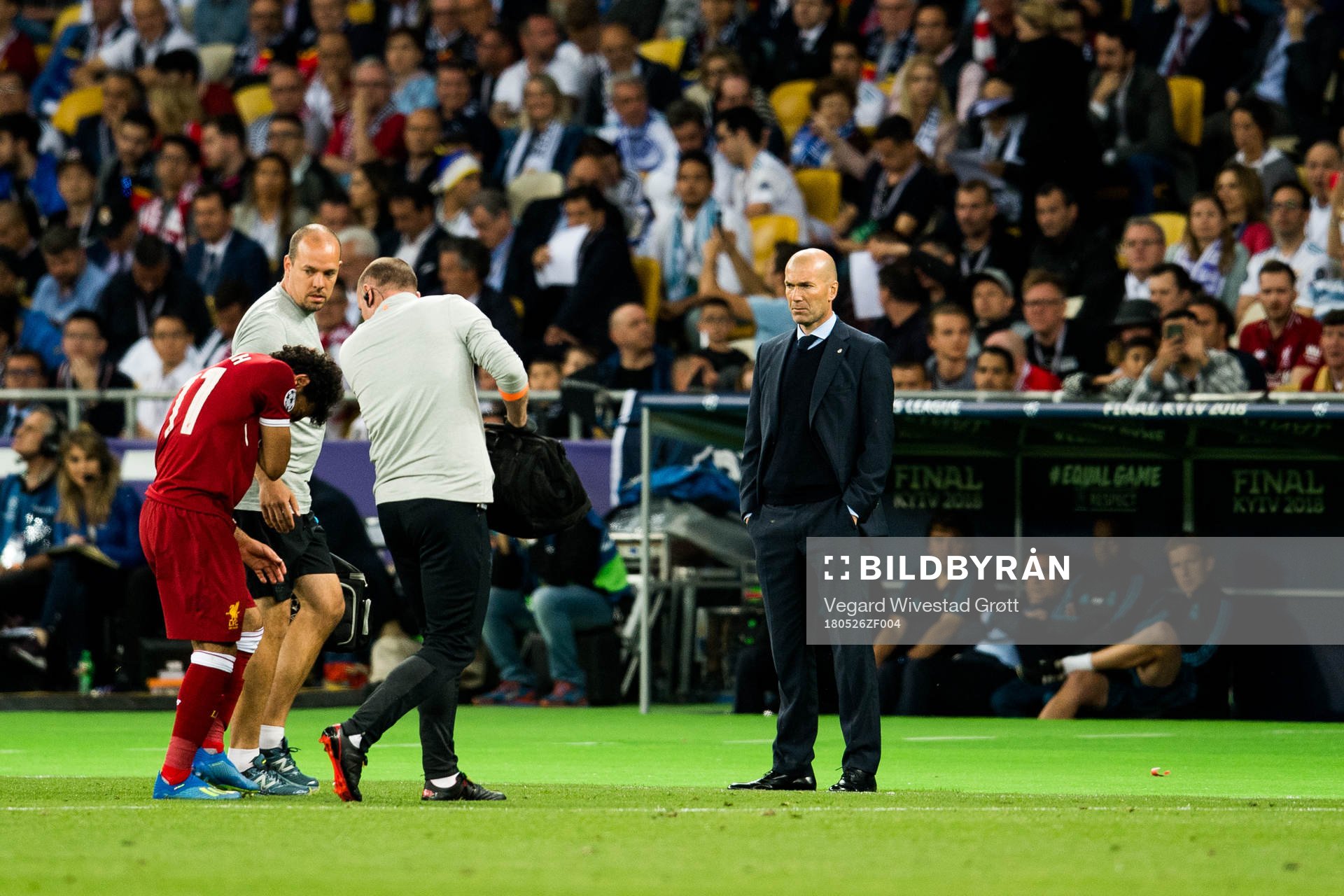 Mohamed Salah of Liverpool with an injury and Zinedine