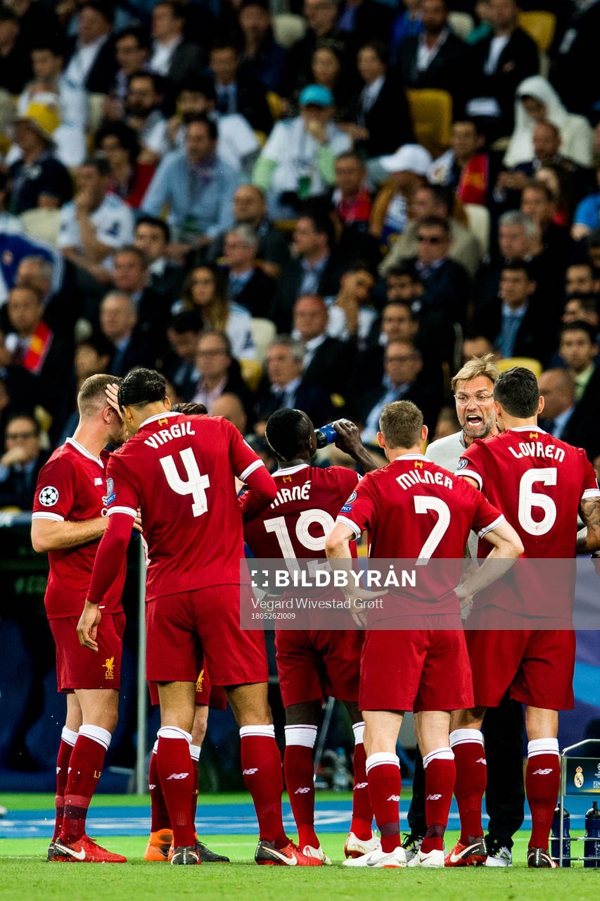 Jürgen Klopp, head coach of Liverpool, with his players