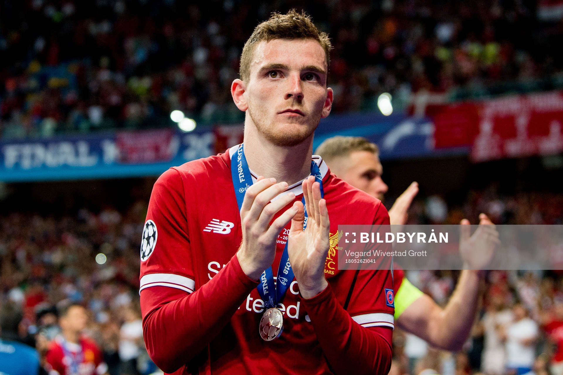 Andy Robertson of Liverpool looks dejected