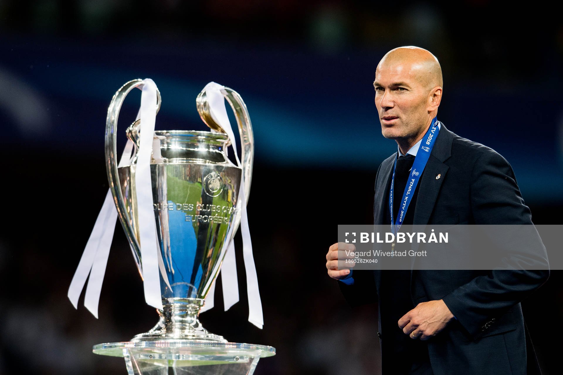 Zinedine Zidane, head coach of Real Madrid, with the trophy