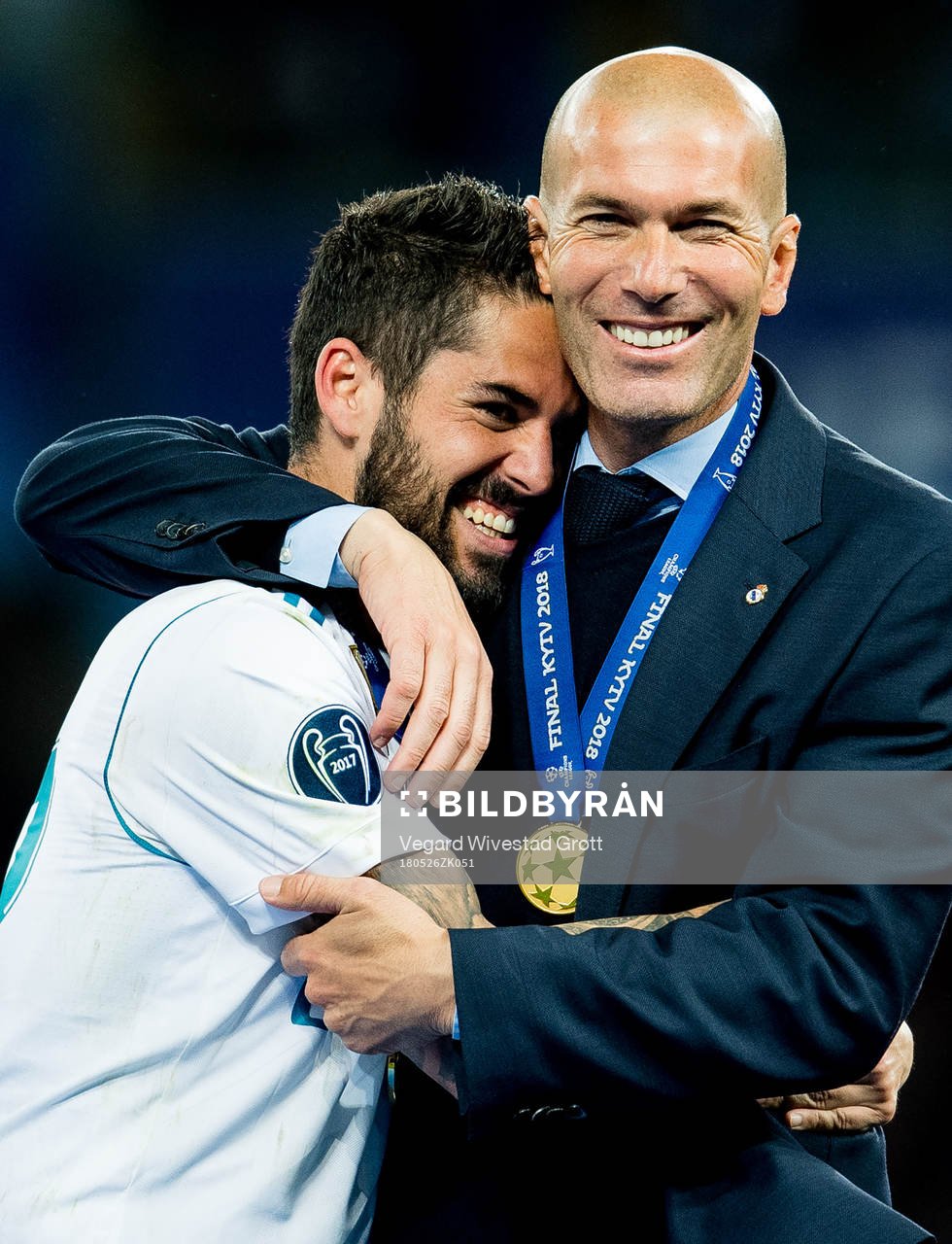 Isco and Zinedine Zidane, head coach of Real Madrid,
