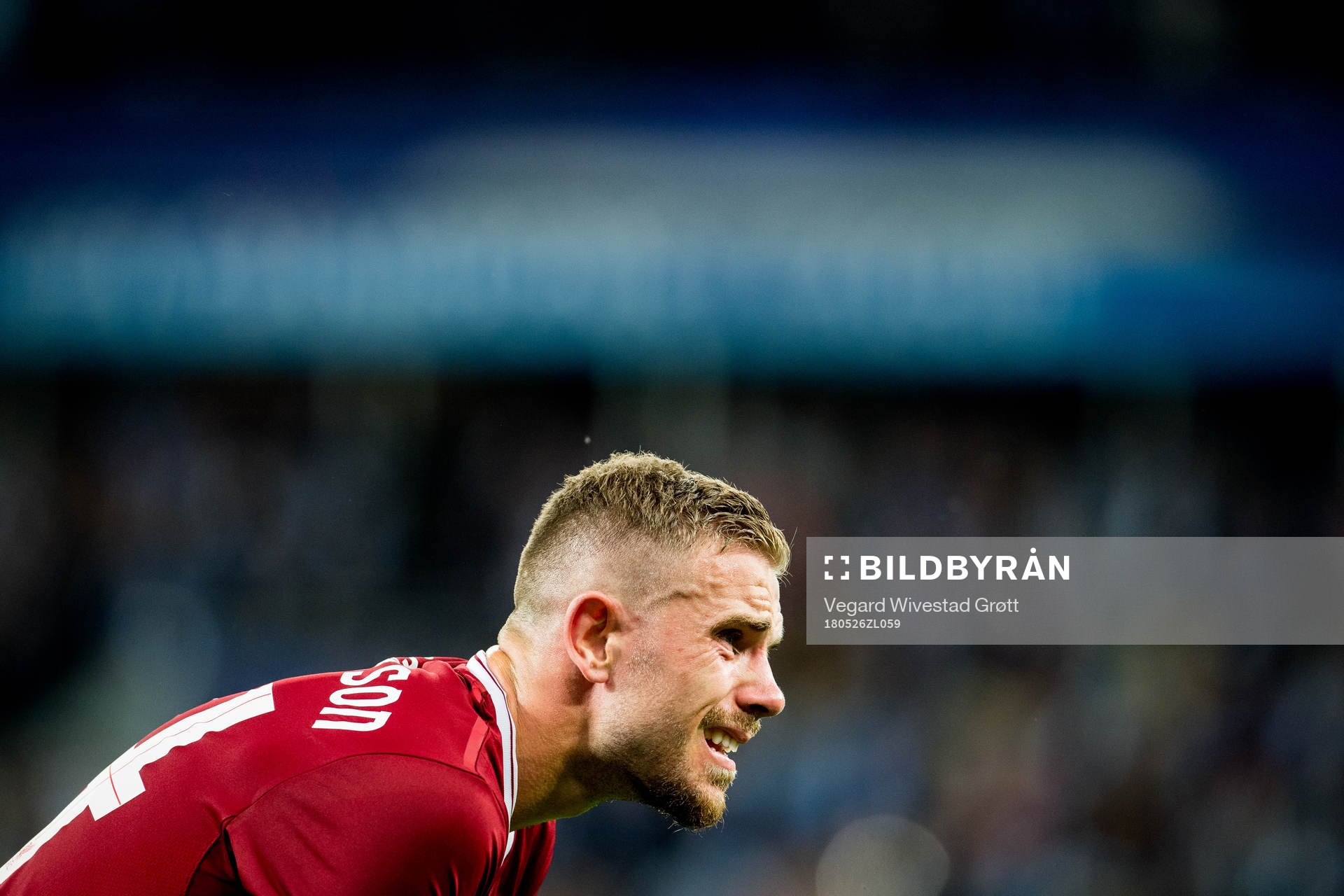 Jordan Henderson of Liverpool looks dejected