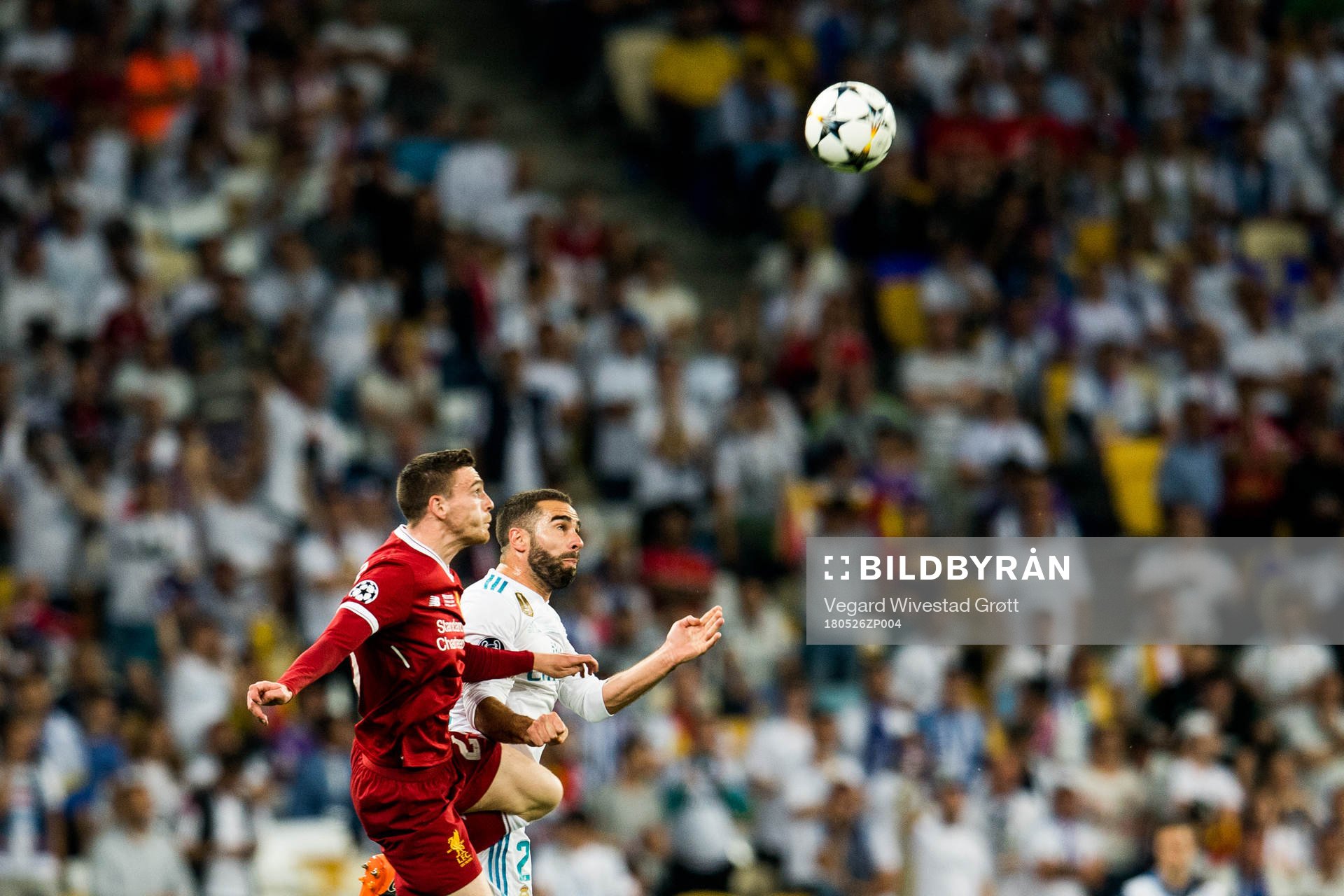 Andy Robertson of Liverpool and Dani Carvajal of Real Madrid