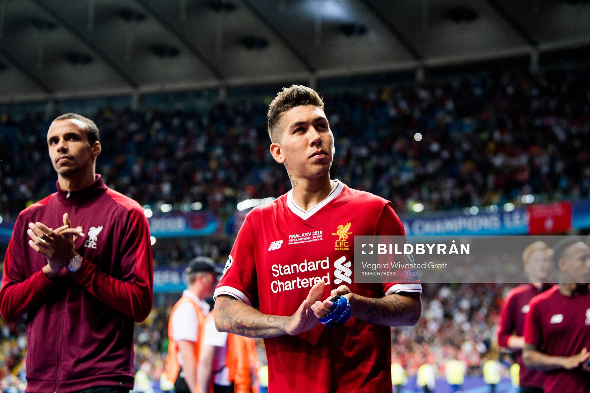 Roberto Firmino of Liverpool looks dejected