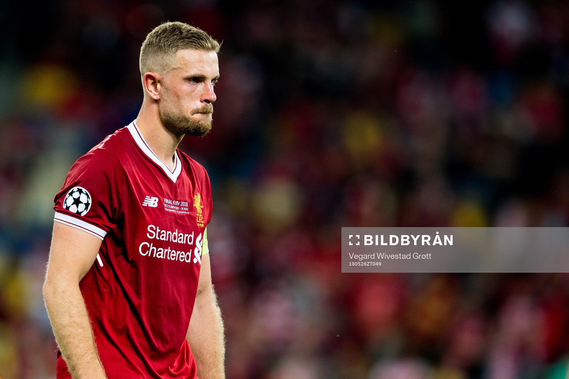 Jordan Henderson of Liverpool looks dejected