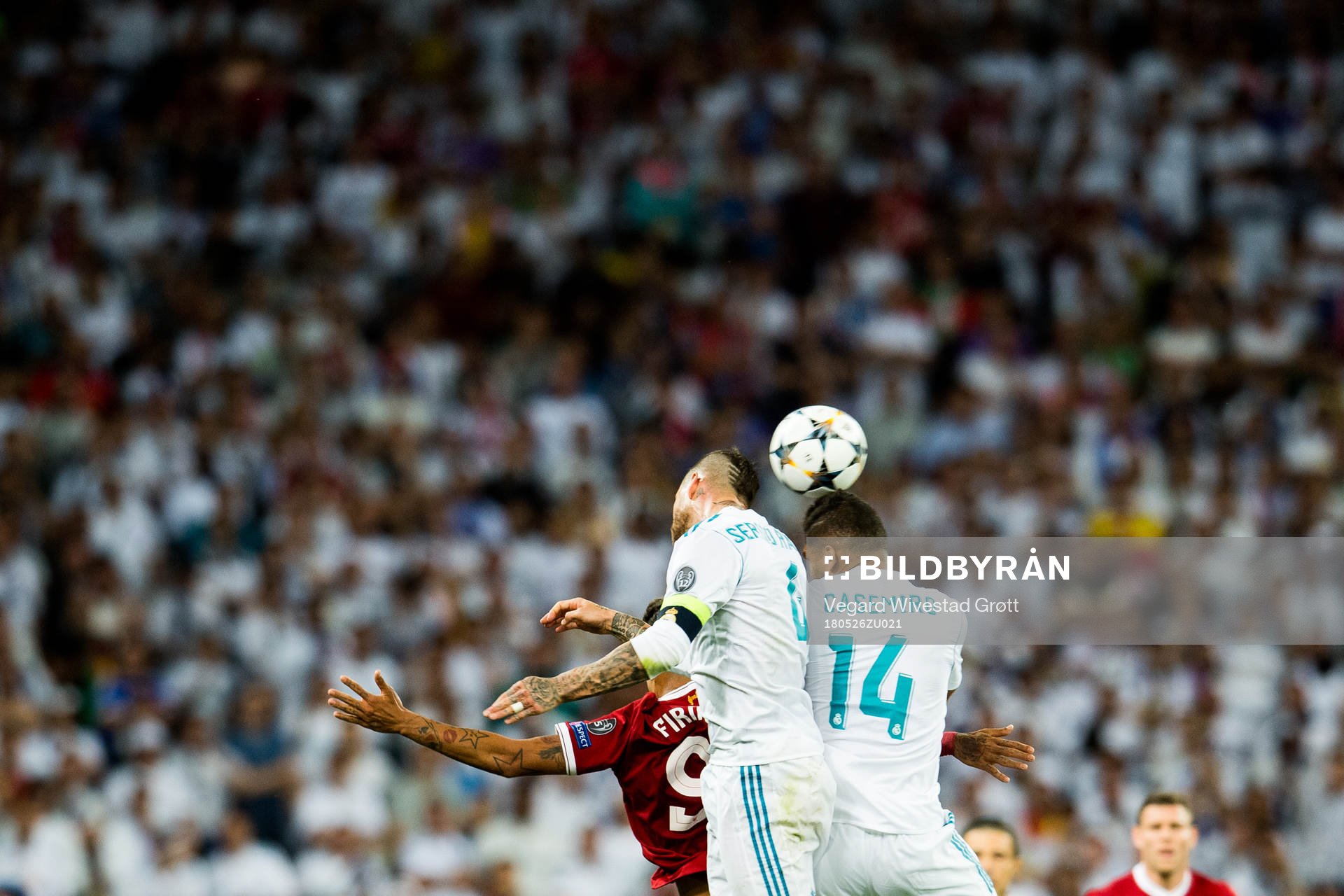 Roberto Firmino of Liverpool, Sergio Ramos and Casemiro of