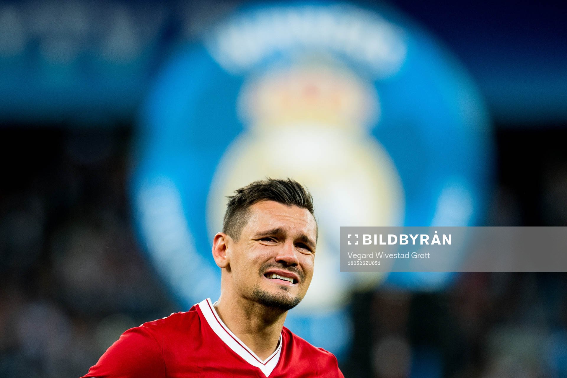 Dejan Lovren of Liverpool looks dejected