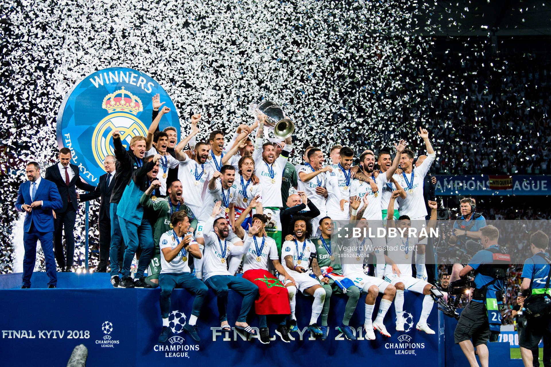 Players of Real Madrid celebrate with the trophy