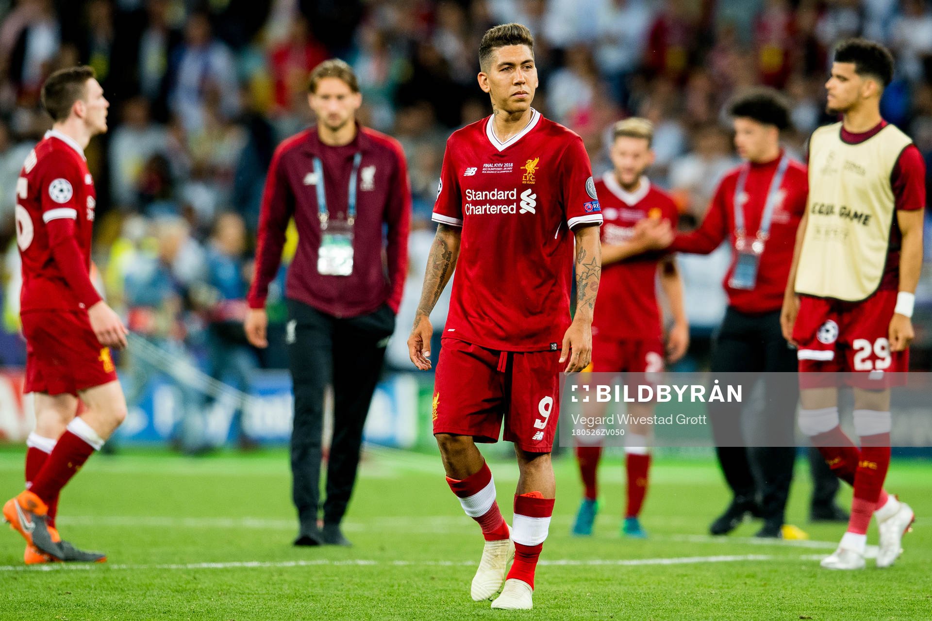 Roberto Firmino of Liverpool looks dejected