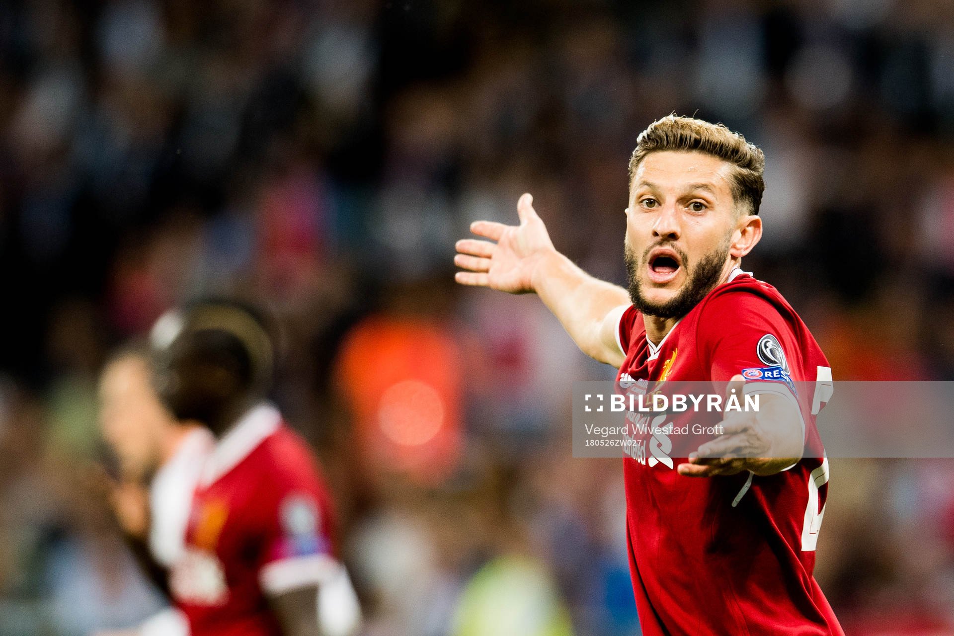 Adam Lallana of Liverpool reacts