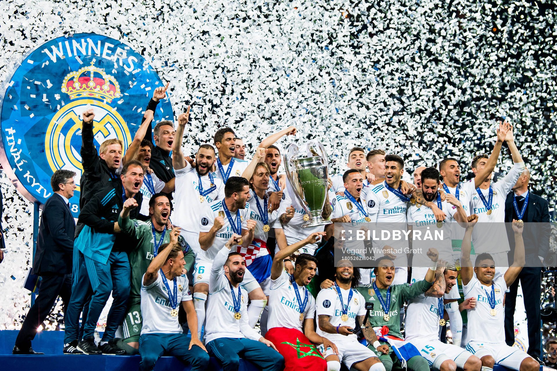 Players of Real Madrid celebrate with the trophy