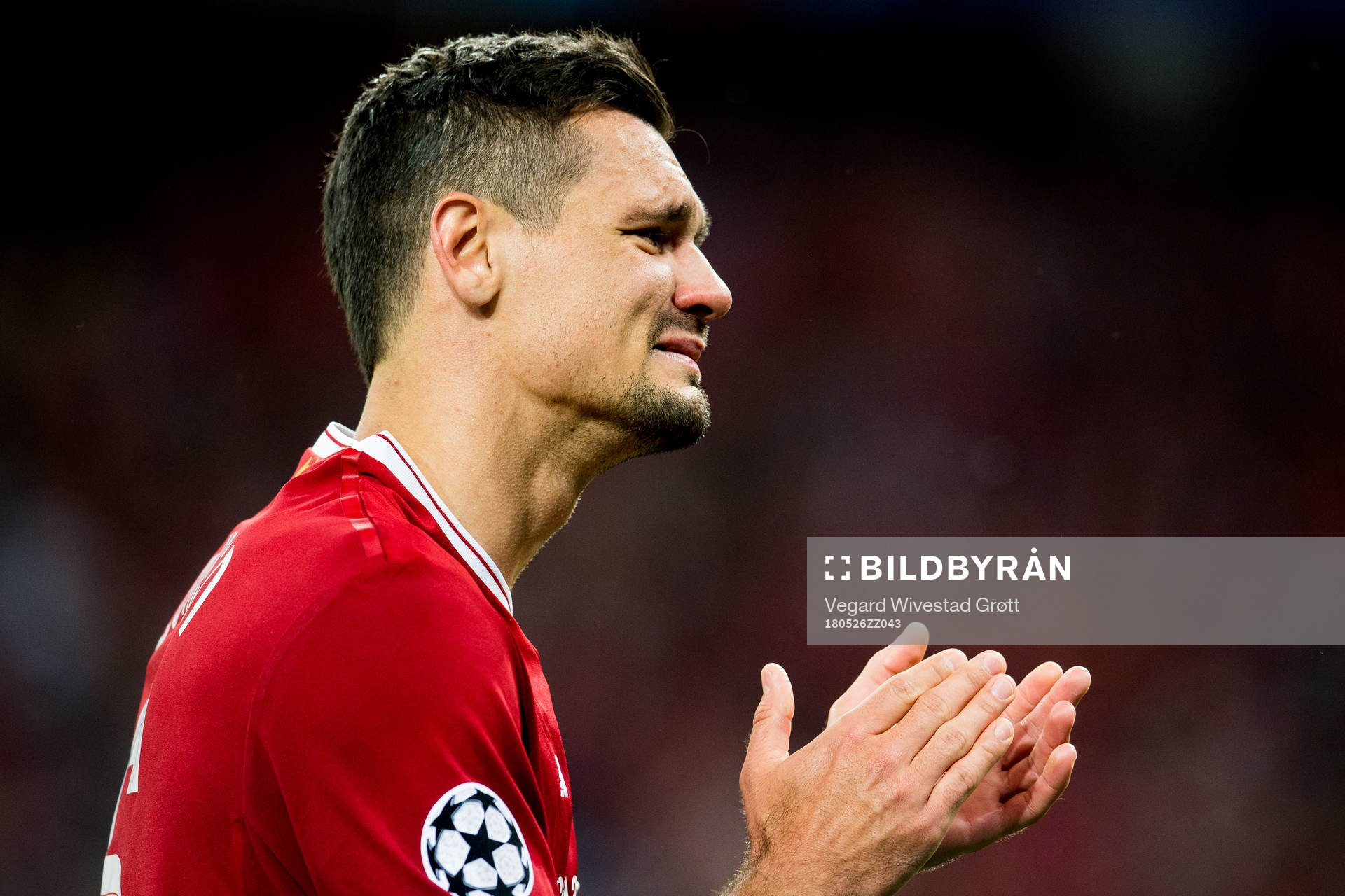 Dejan Lovren of Liverpool looks dejected