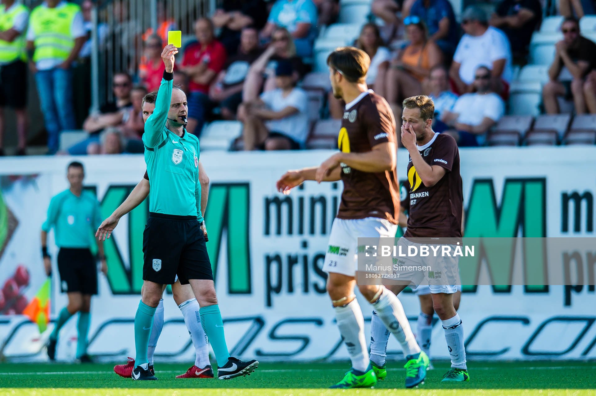 Mads Westlie Gundersen of Mjøndalen gets a yellow card