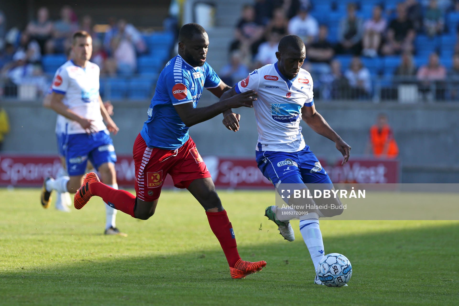 Christian Landu-Landu from Tromsø in action against Ben Karamoko from Haugesund during the Eliteserien match between Haugesund and Tromsø on May 27, 2018 in Haugesund.
