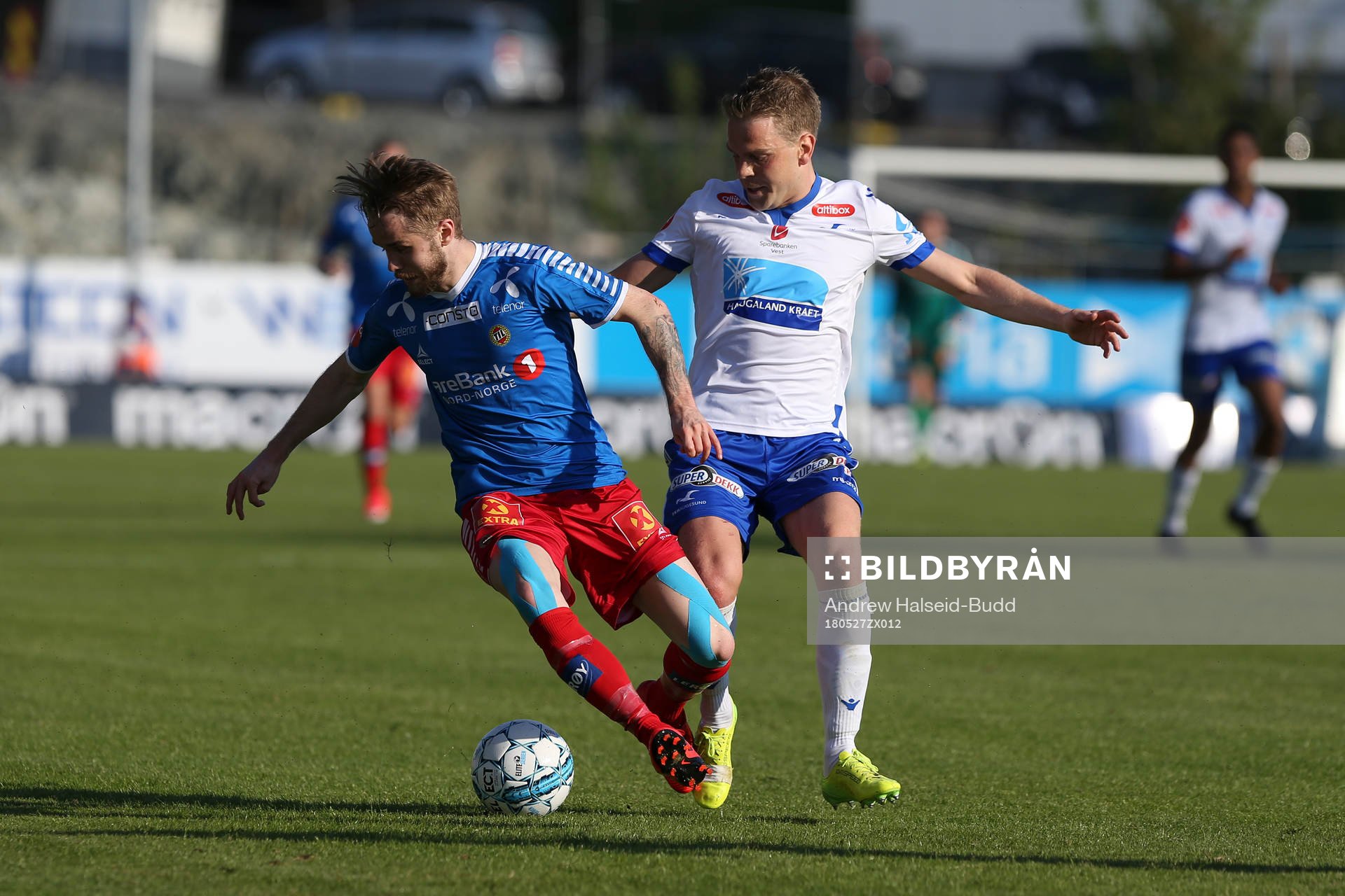 Daniel Berntsen of Tromsø in action against Joakim Nilsen from Haugesund during the Eliteserien match between Haugesund and Tromsø on May 27, 2018 in Haugesund.