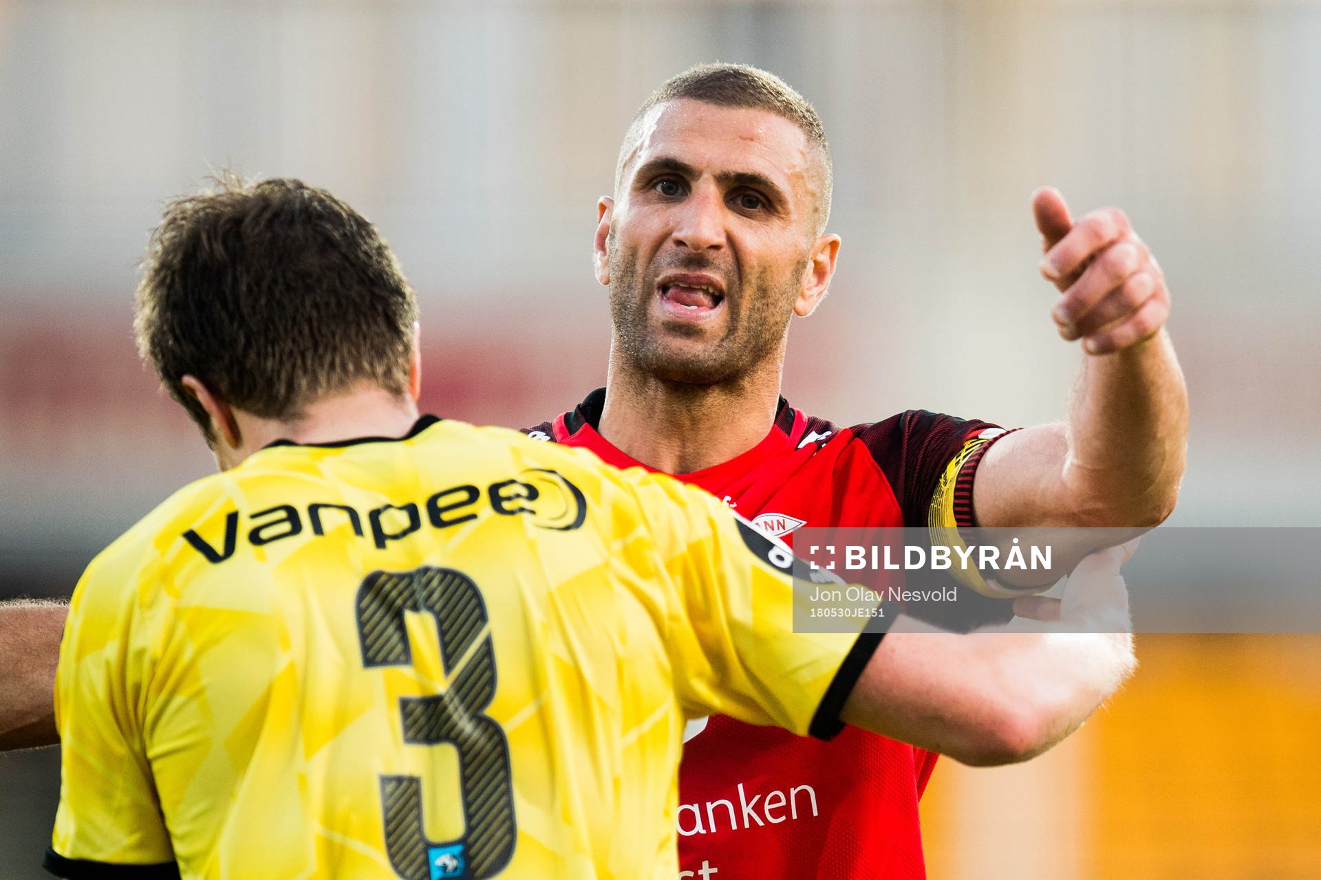 Simen Kind Mikalsen of Lillestrøm and Azar Karadas of Brann