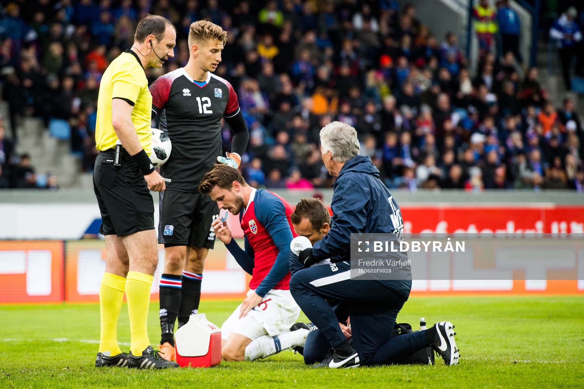 Håvard Nordtveit of Norway with an injury