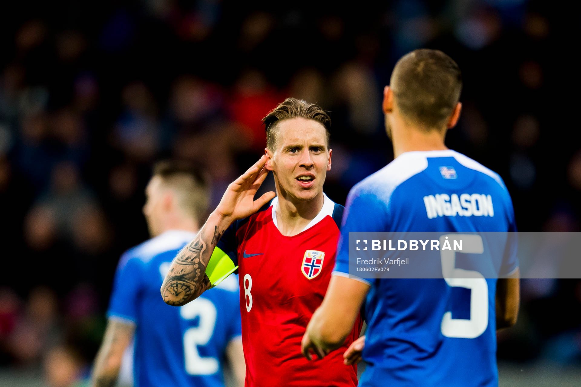 Stefan Johansen of Norway and Sverrir Ingason of Iceland