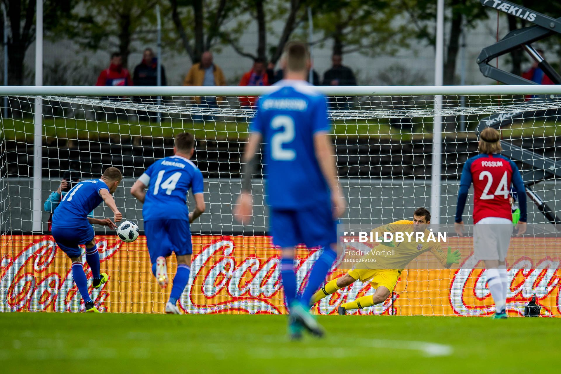 Ottar Magnus Karlsson of Iceland scores 1-1 behind