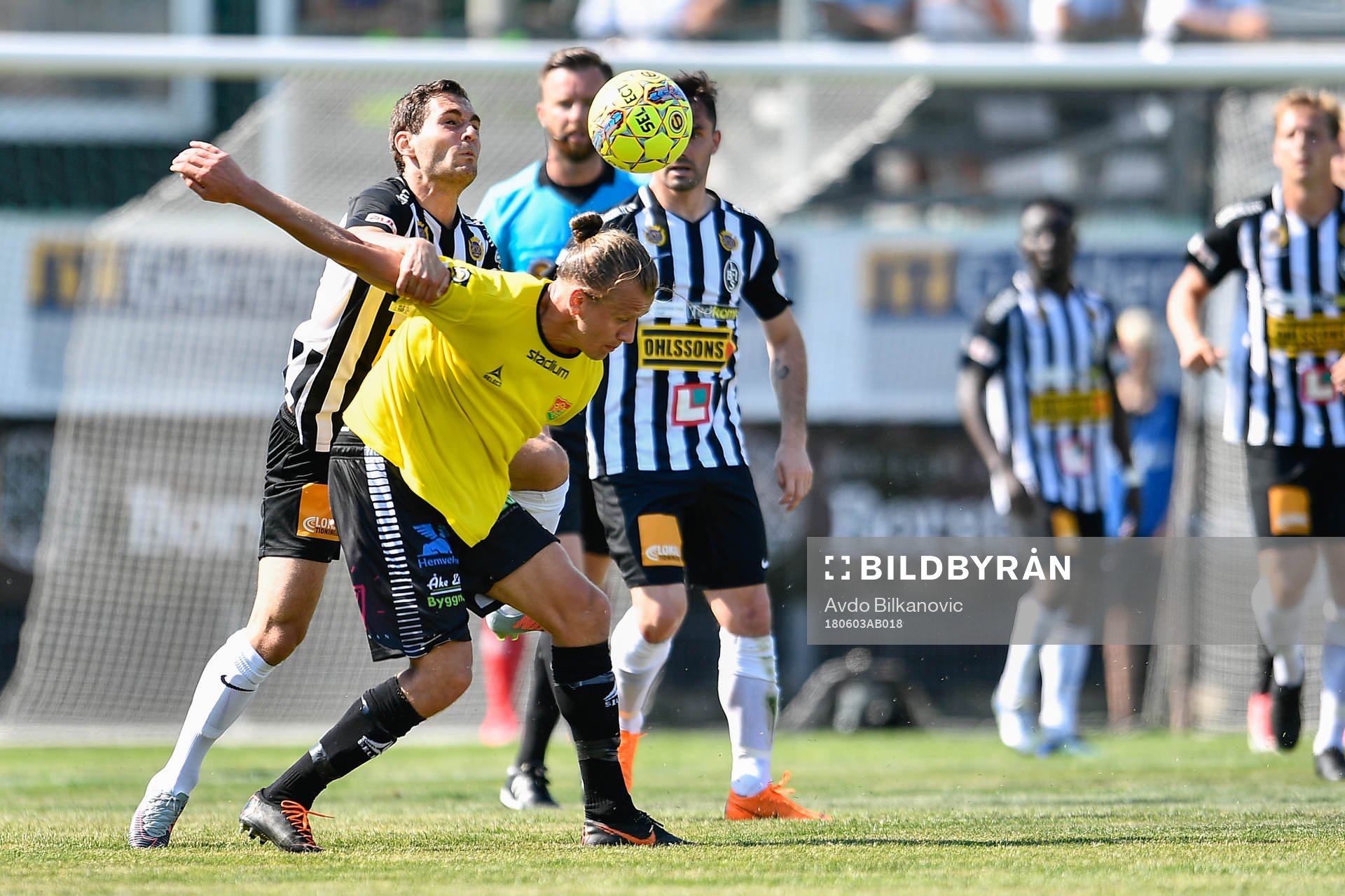 Landskronas Alexander Tkacz i kamp om bollen med GAIS Jesper Westermark under fotbollsmatchen i Superettan mellan Landskrona och GAIS den 3 juni 2018 i Landskrona.