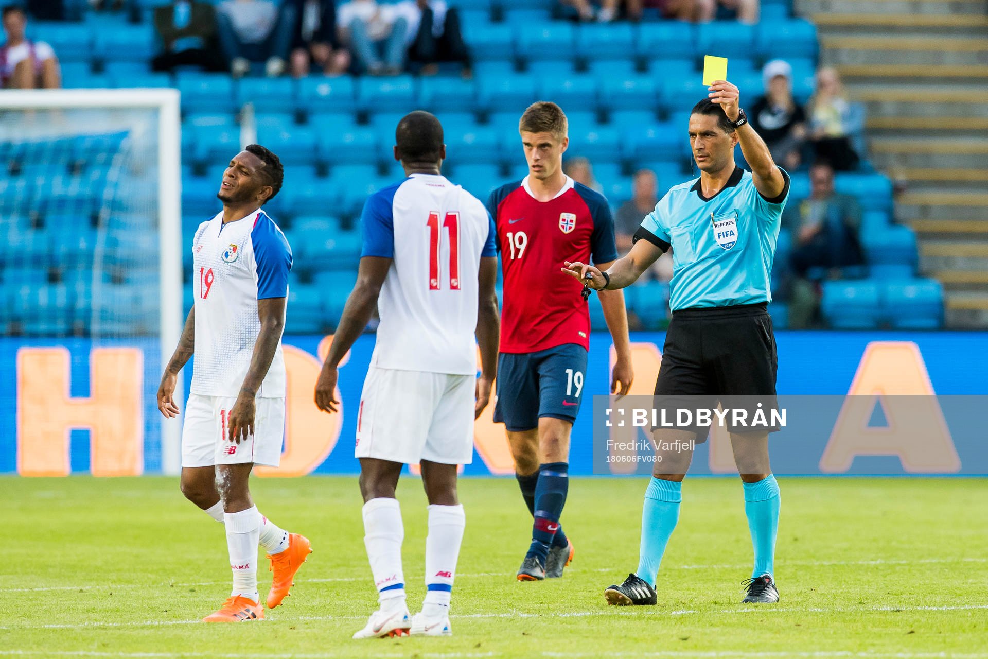 Alberto Quintero of Panama is show a yellow card by referee