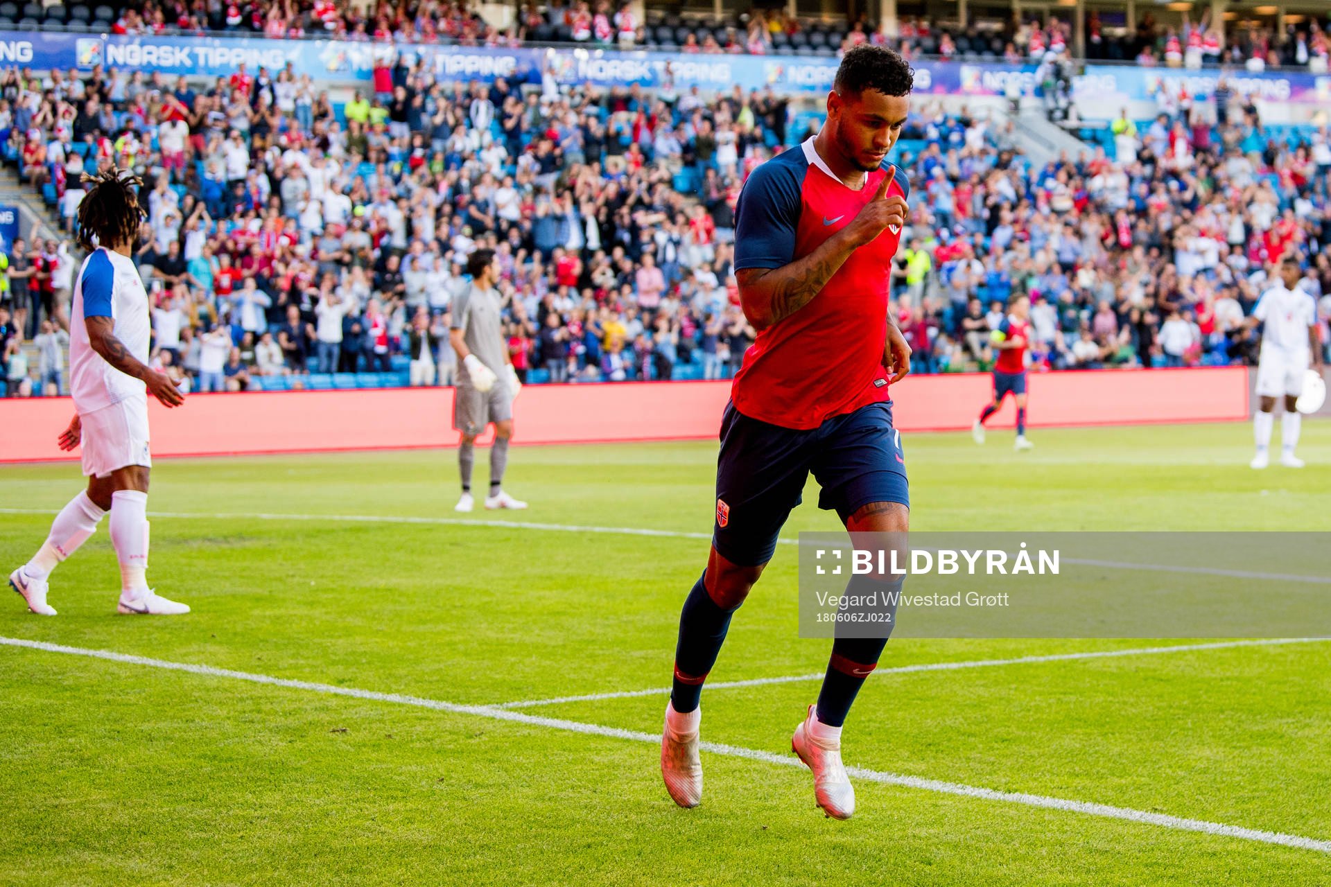 Joshua King of Norway celebrates scoring 1-0