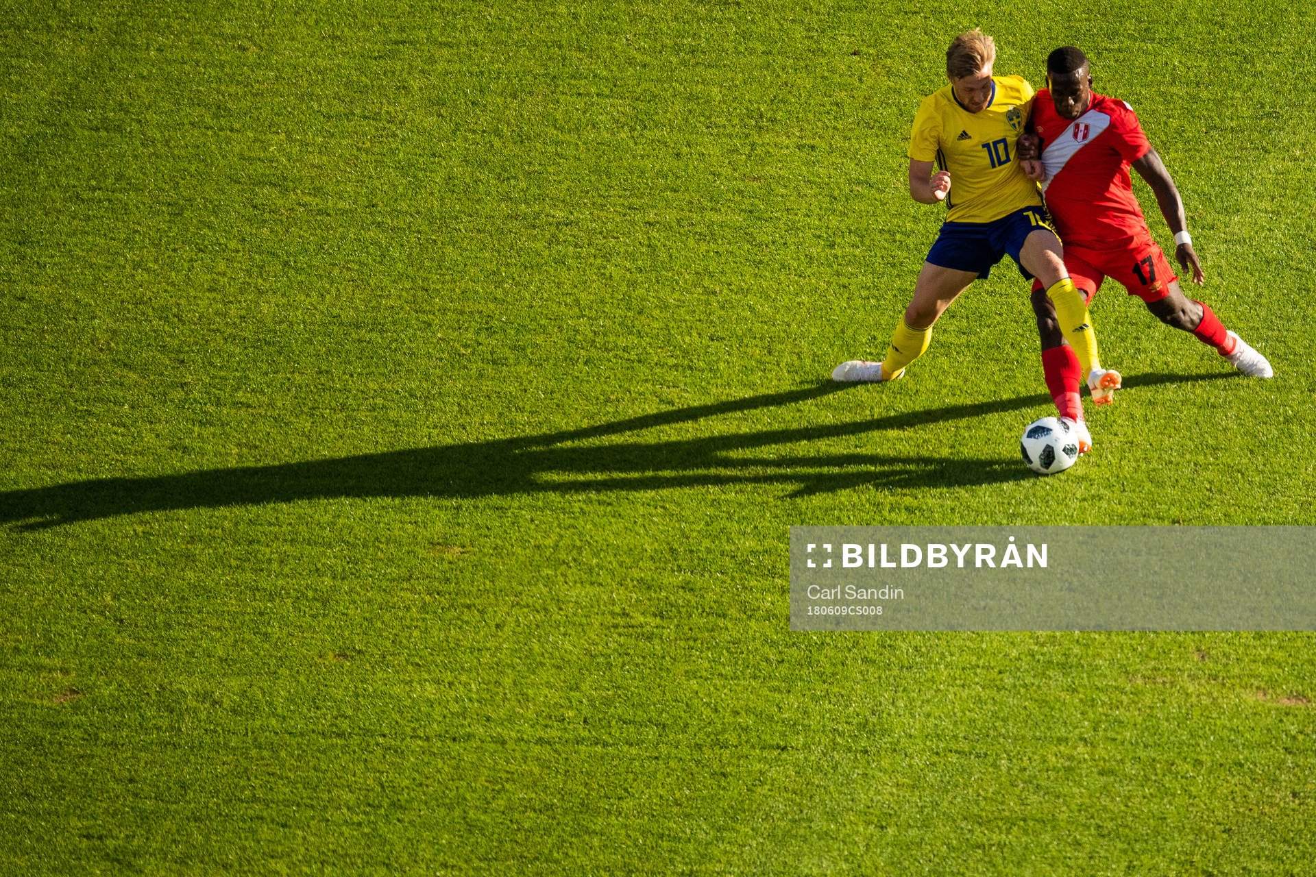 Emil Forsberg of Sweden competes for the ball with Luis