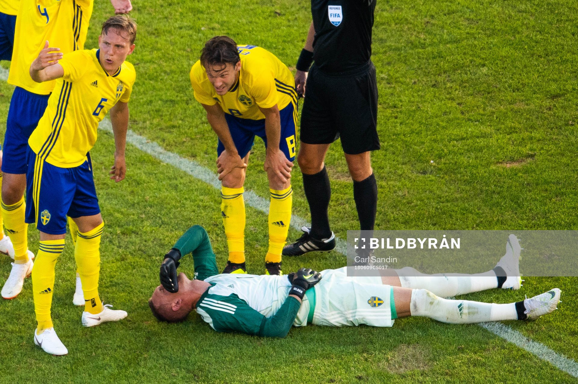 goalkeeper Robin Olsen of Sweden lies down