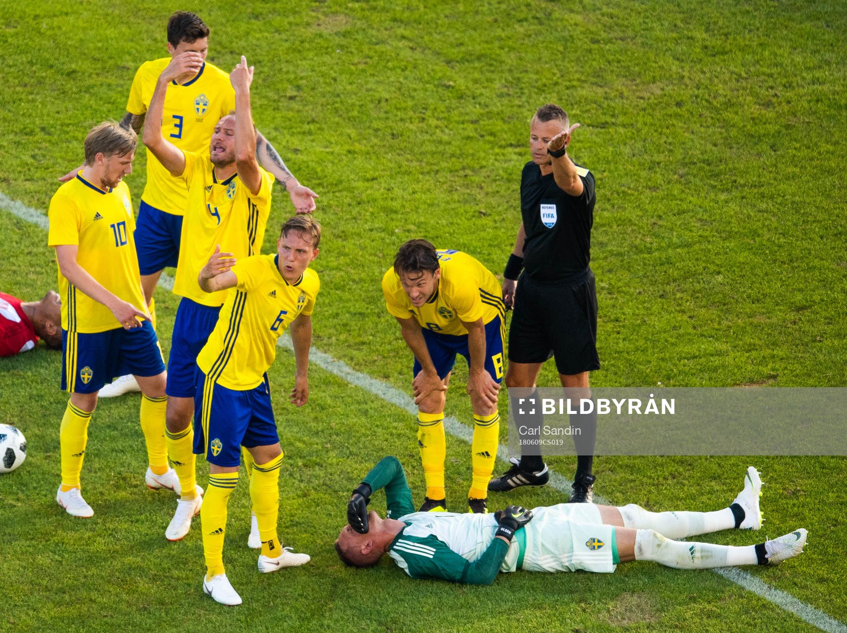 goalkeeper Robin Olsen of Sweden lies down