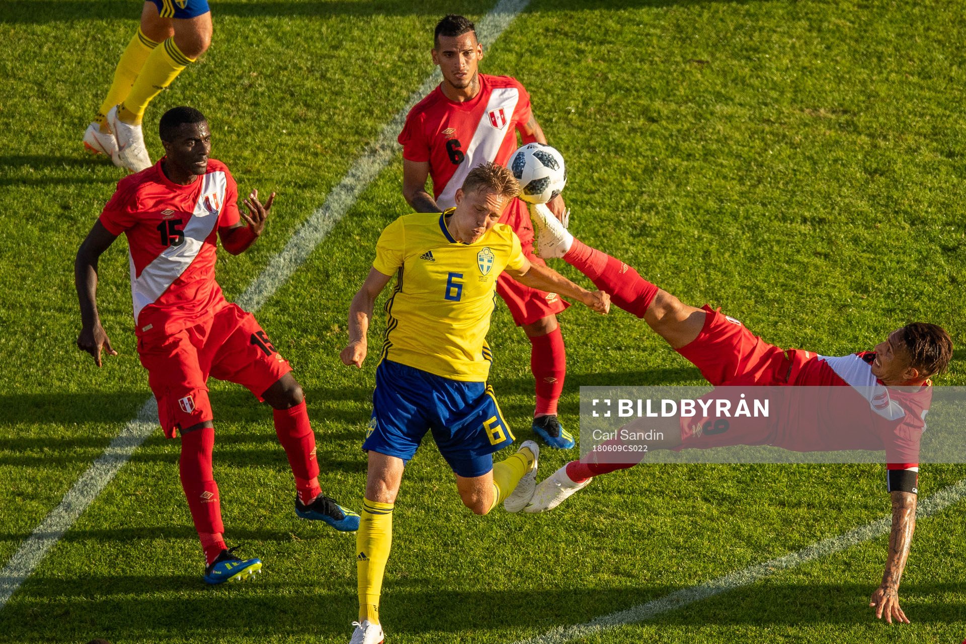 Ludwig Augustinsson of Sweden and Paolo Guerrero of Peru