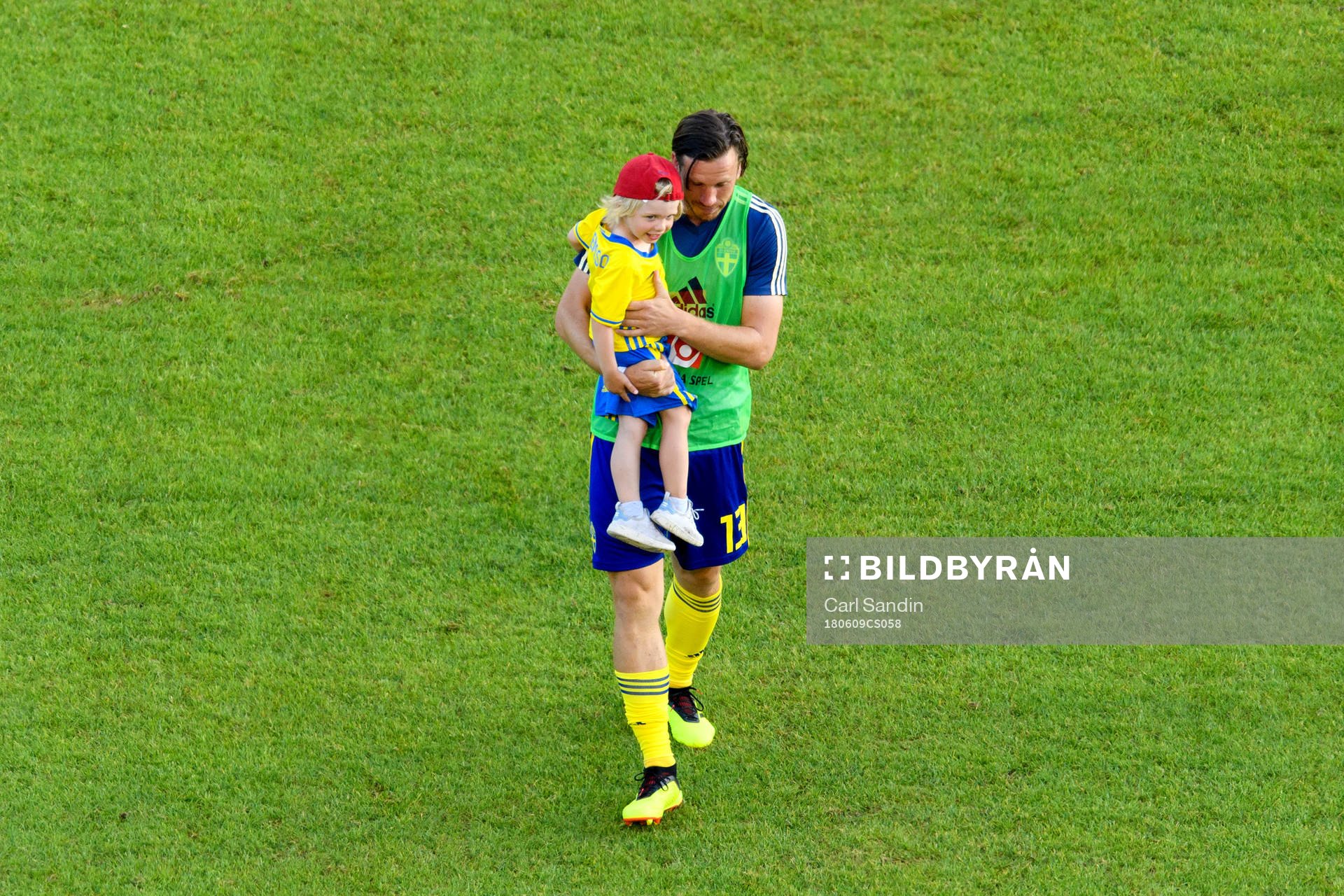 Gustav Svensson of Sweden with his child