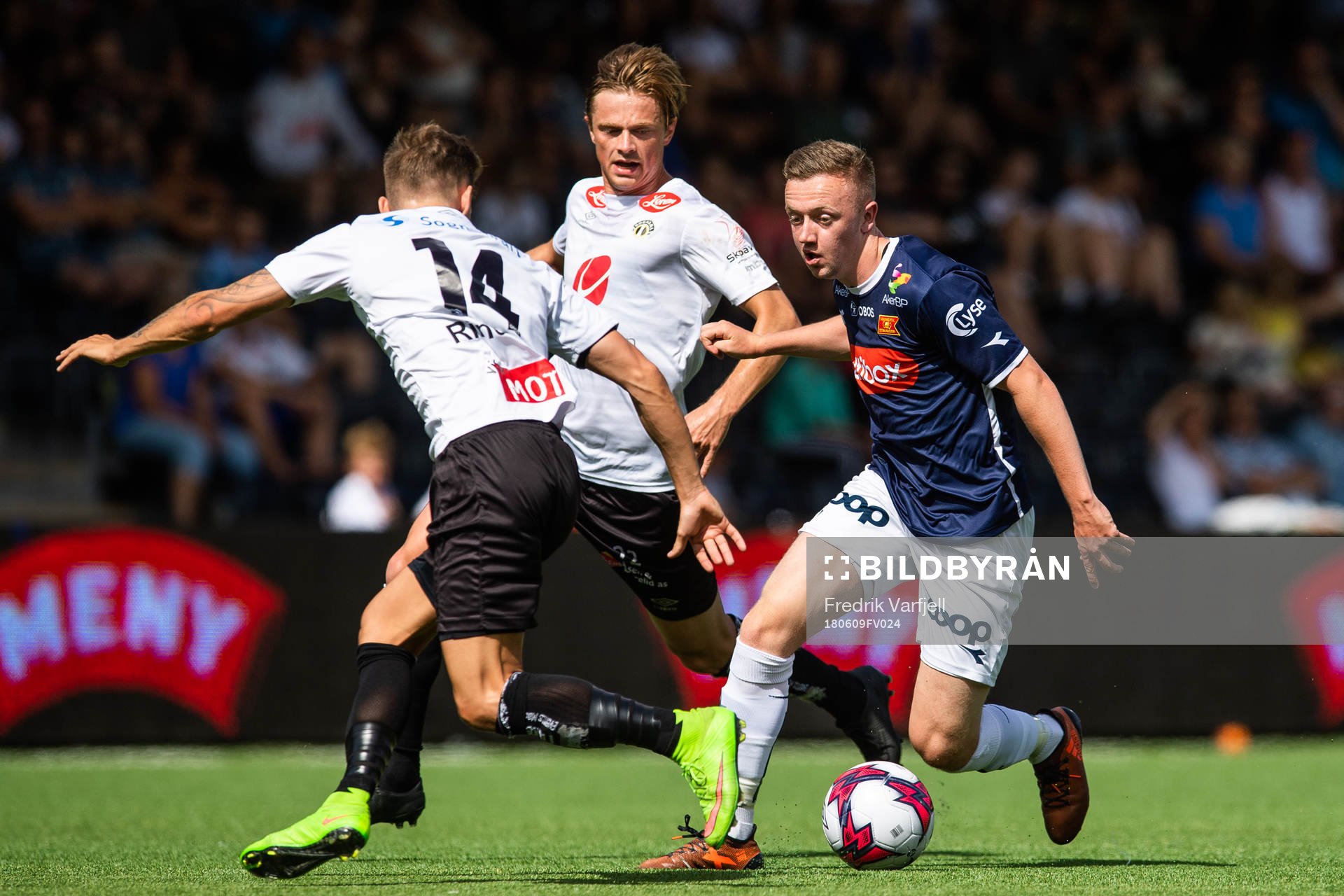 Ole Martin Rindarøy of Sogndal competes for the ball with